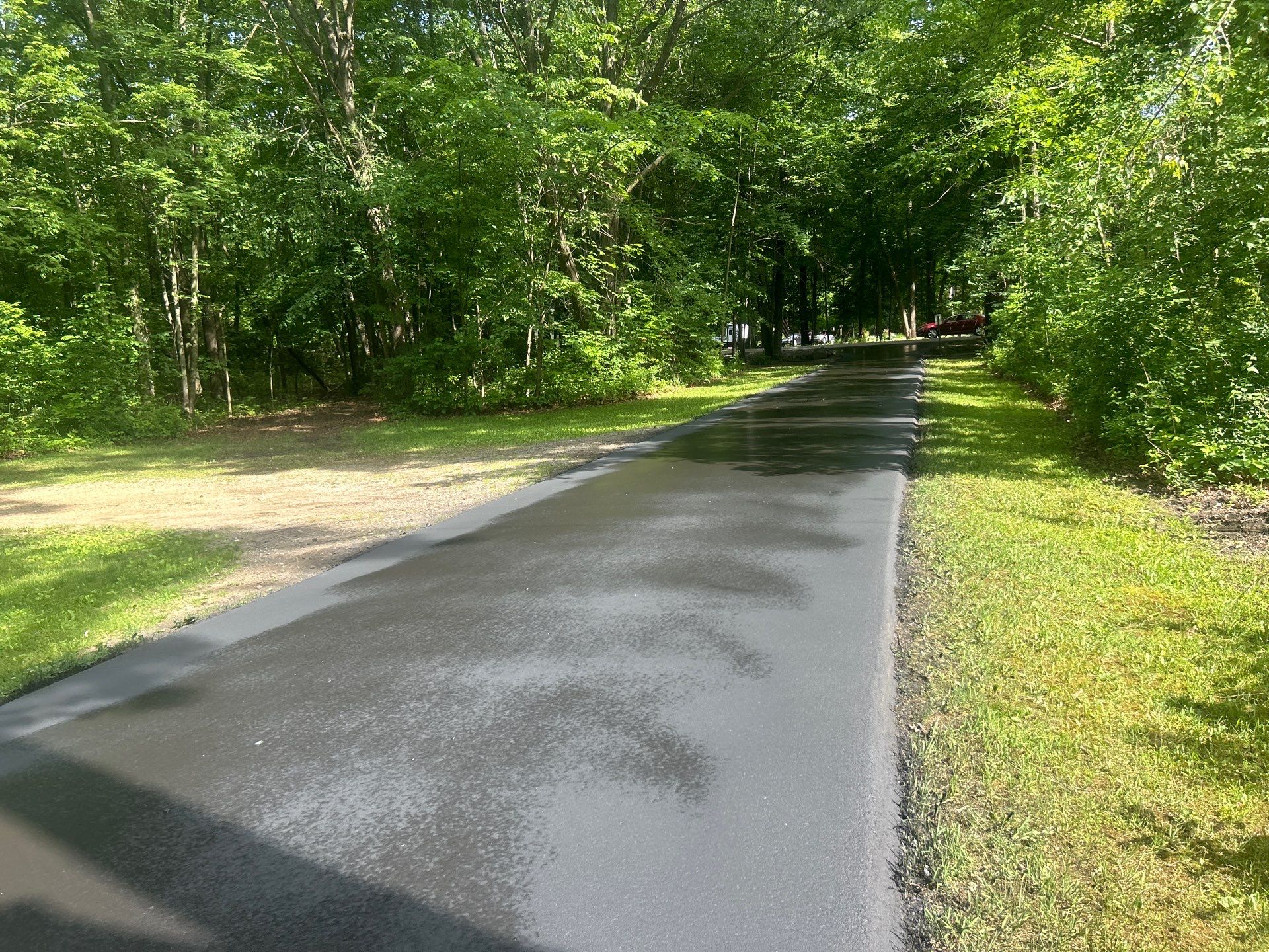 High end residential driveway by Quality Asphalt & Maintenance LLC