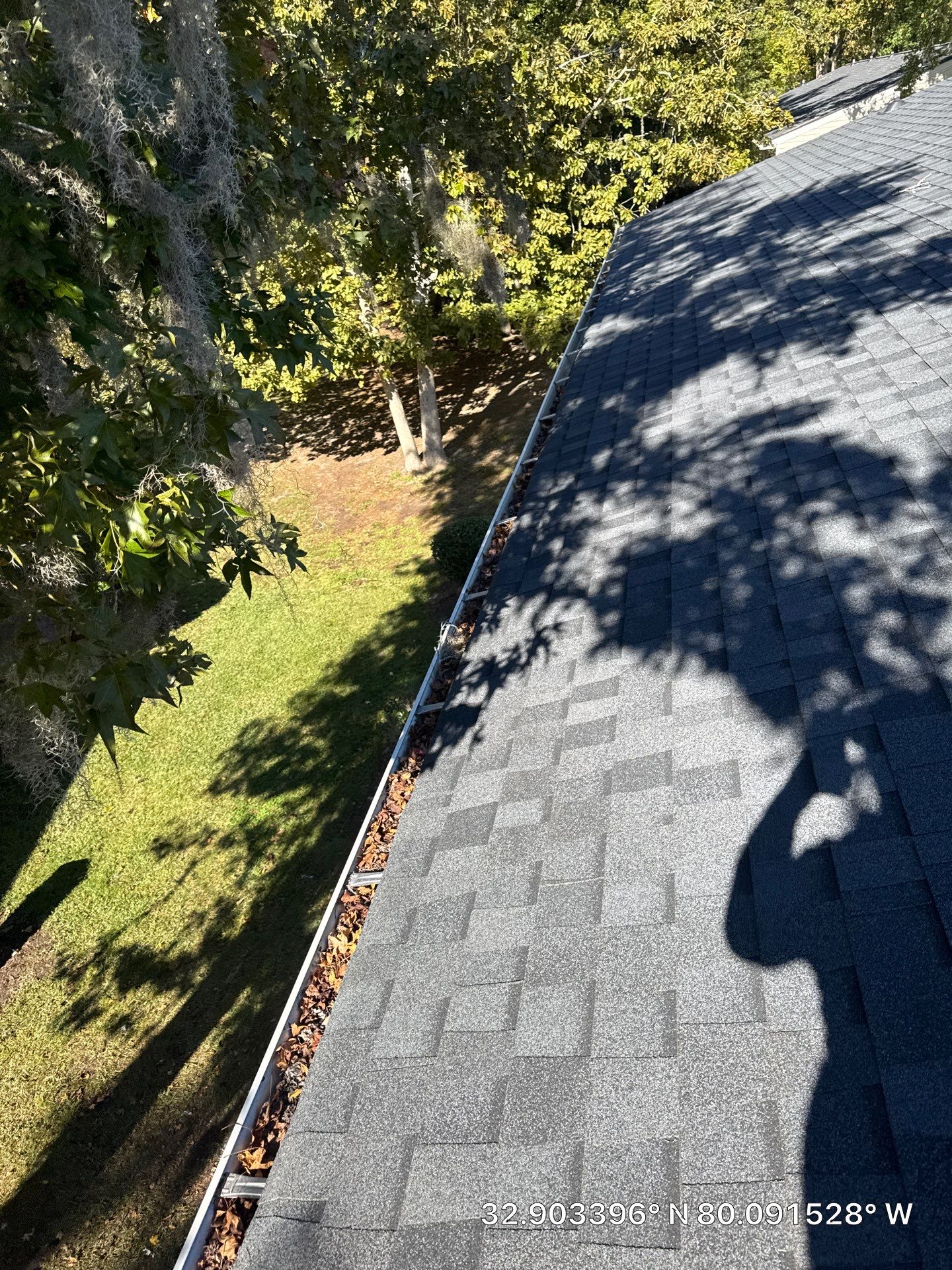 HOA gutter cleaning in Summerville & Goose Creek before  photo showing full gutters