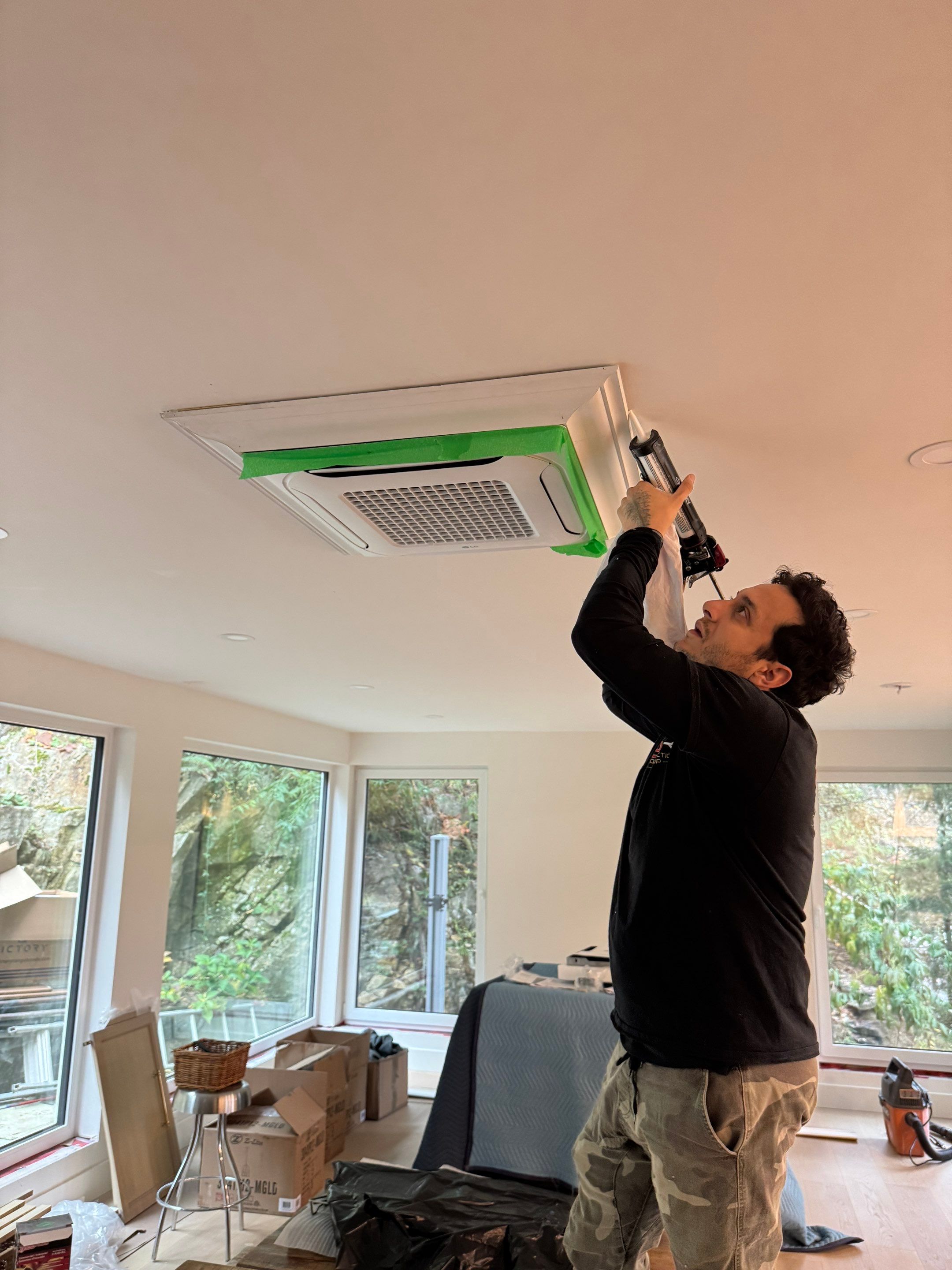 West Vancouver Custom Millwork: Heat Pump Trim & Window Finishing by YVR Construction Group