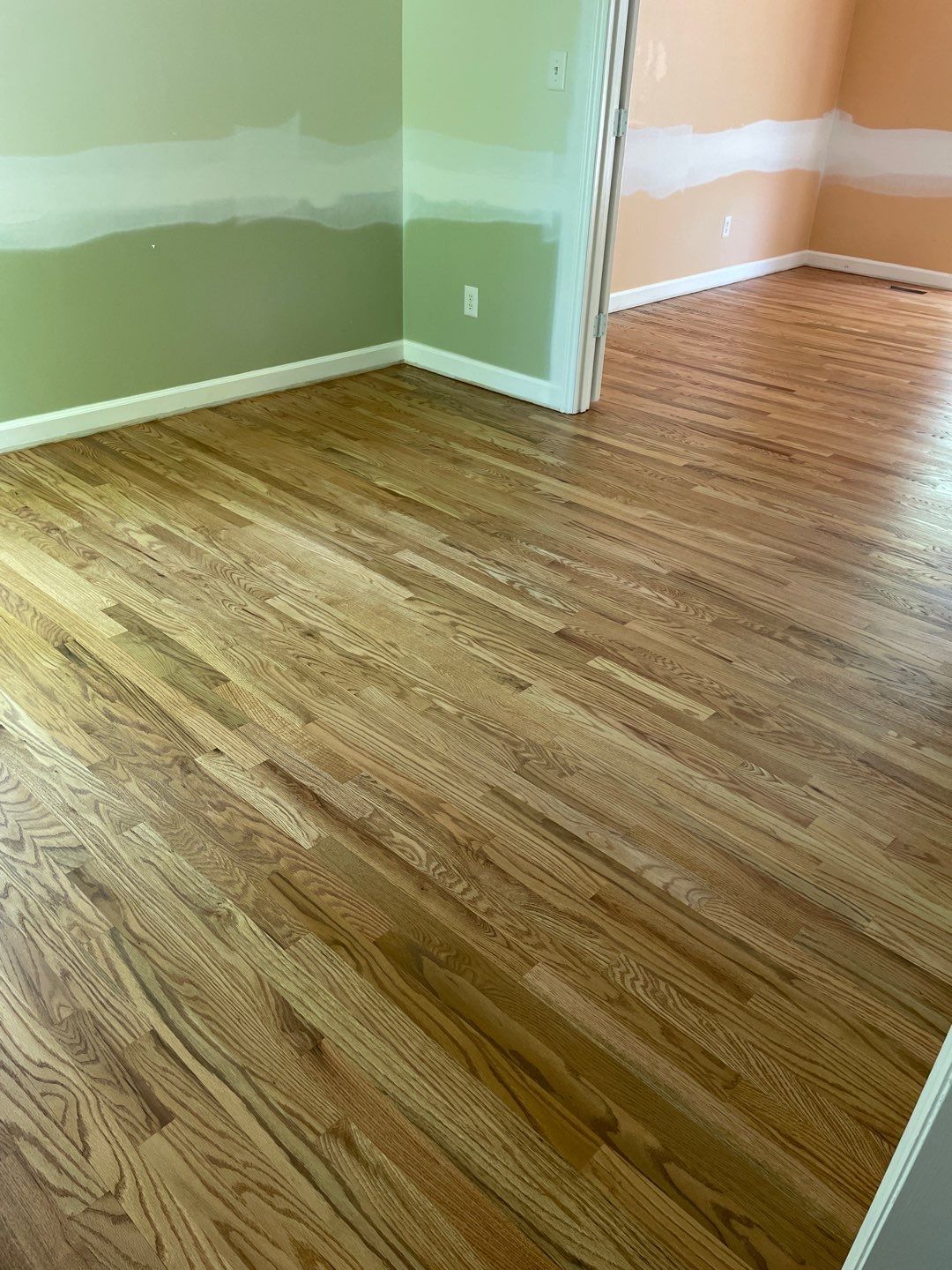 Red oak floor refinishing by Accent Custom Floors