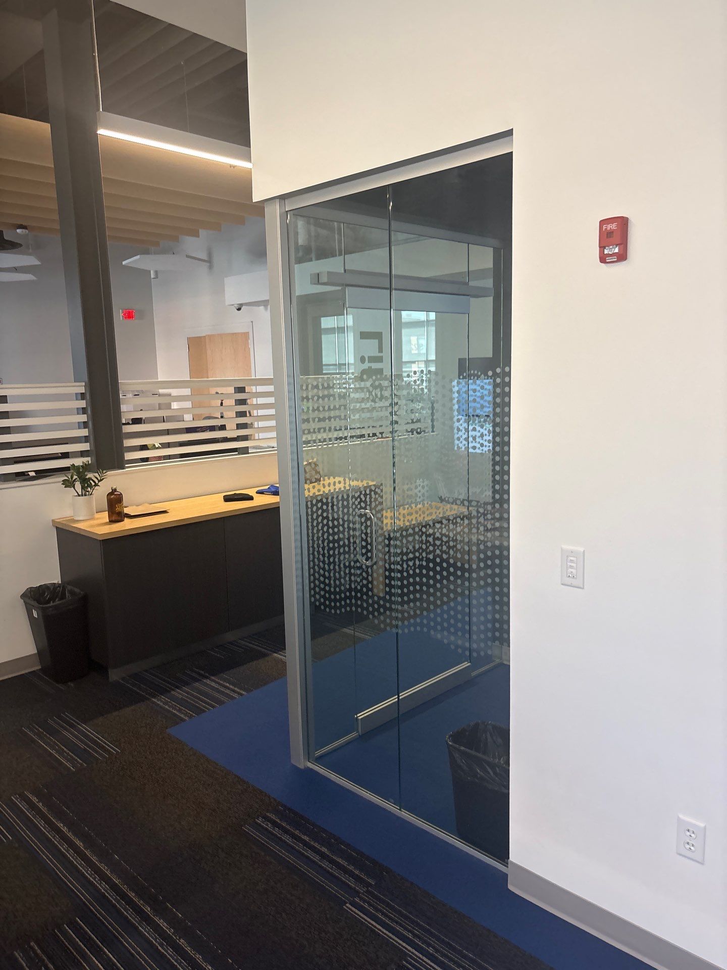 Lincoln Office Interior Remodel with Acoustic Baffles and Glass Walls by CompanyCam Sales Demo