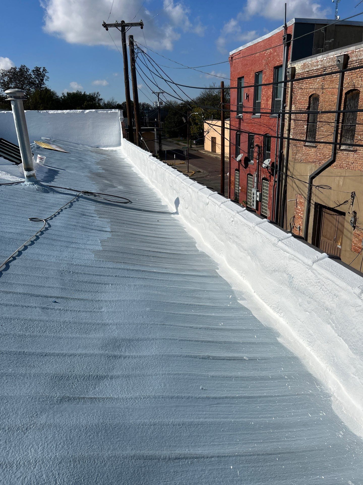Spray Foam Metal Roof Restoration – Commerce, TX by All Star Roofing LLC