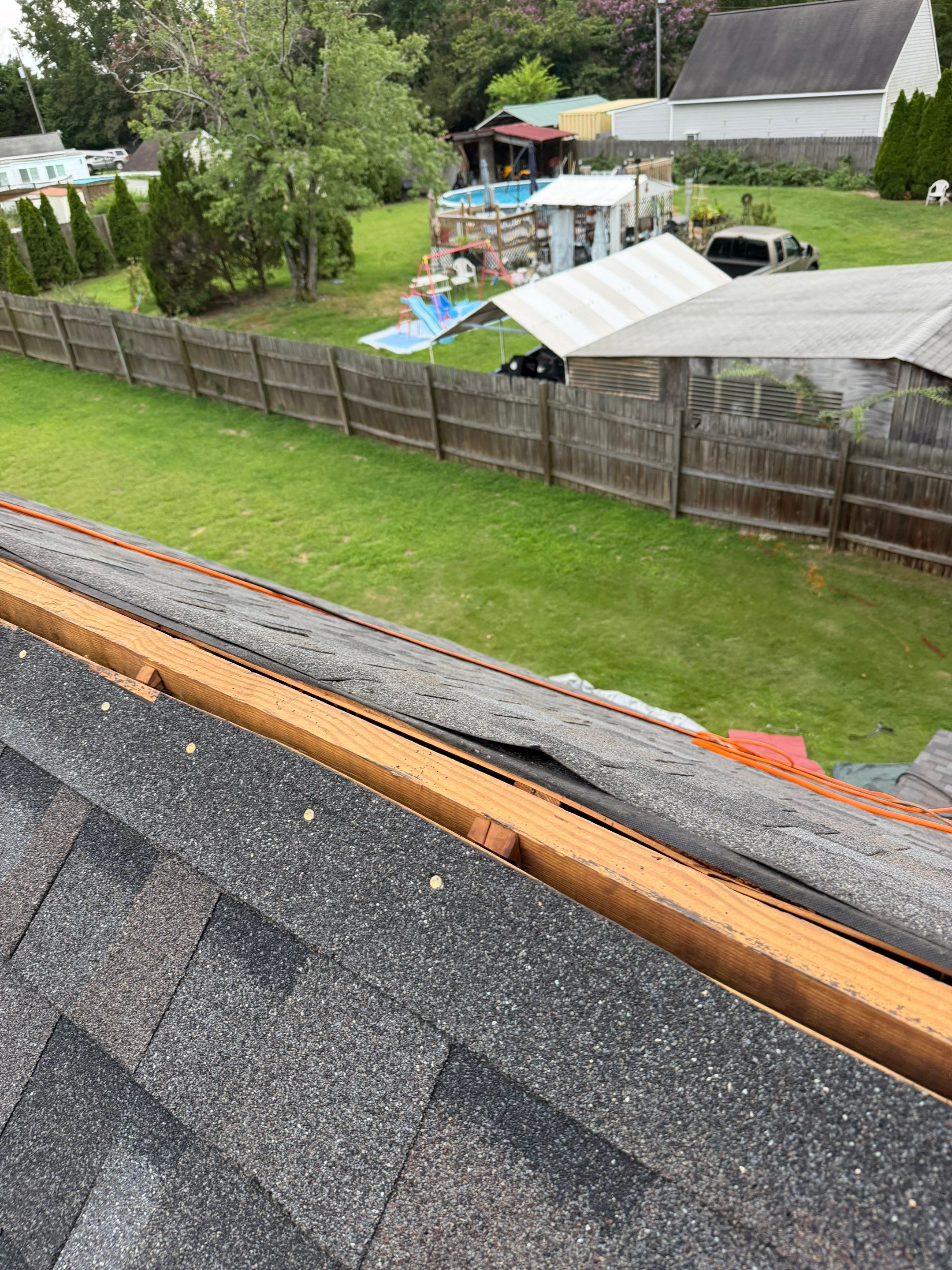 Asphalt Shingle Roof Replacement and Custom Porch Renovation in Hayes by Cade Construction