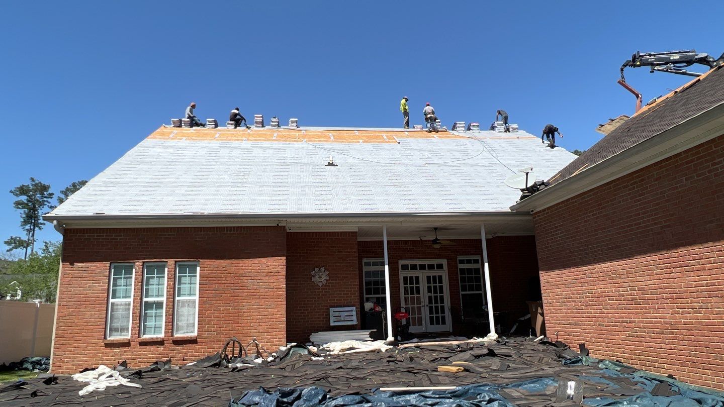 Residential Roofing Installation using Roof Replacement by American Roofing & Construction LLC