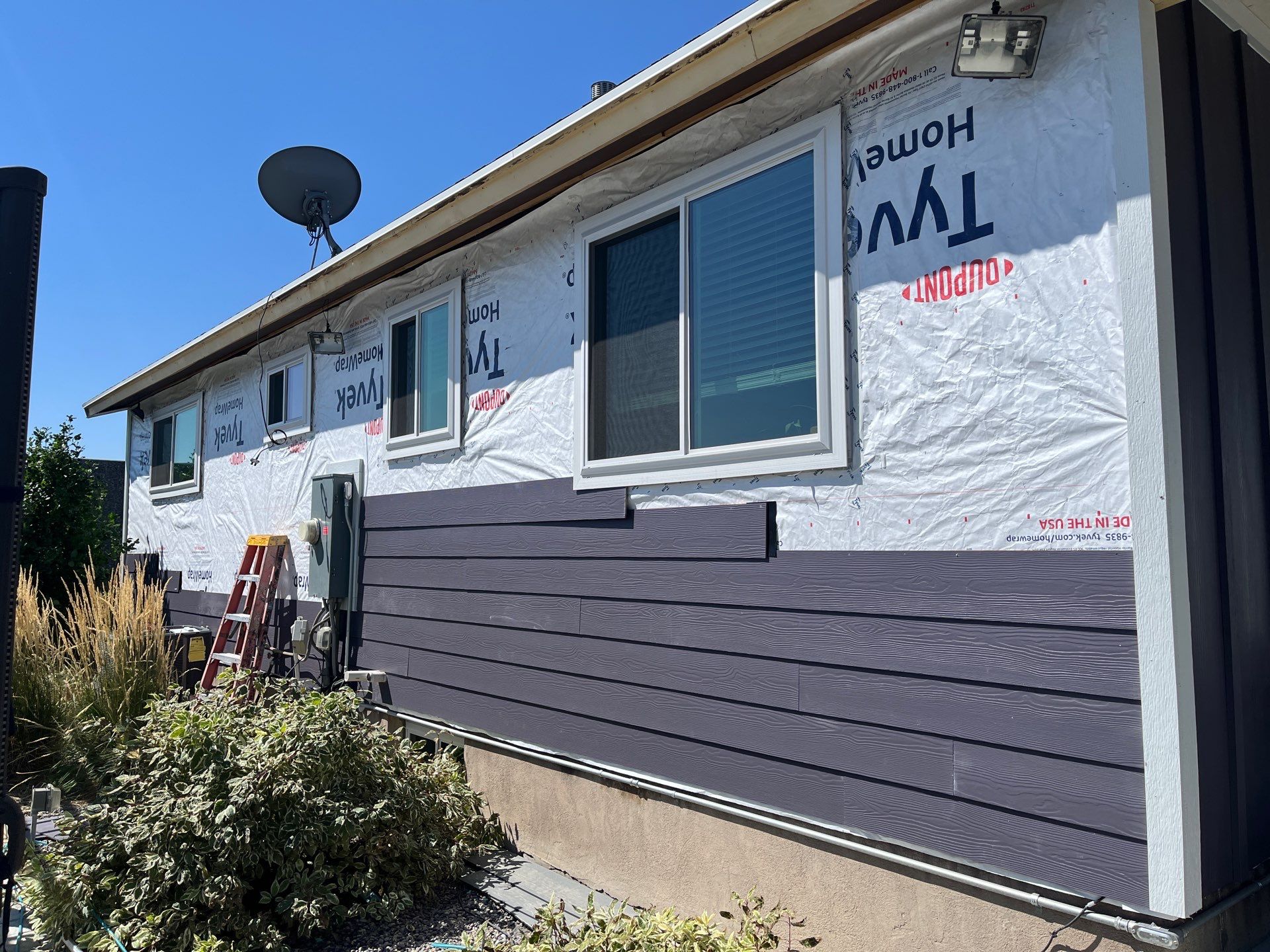 West Jordan | Custom Painted Hardie Upgrade | SW Midnight & Arctic White by Ideal Siding Utah