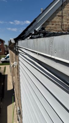 Turtle Shell gutter protection installation in Chicago, IL 60634, photograph 11