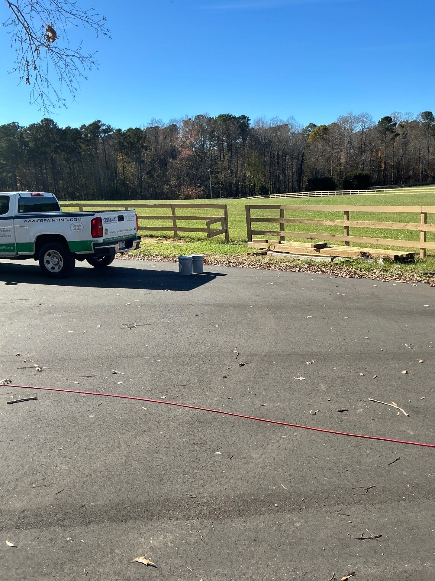 Fence Staining (Farm in Durham NC) by GonzalezPainters & Contractors Inc 