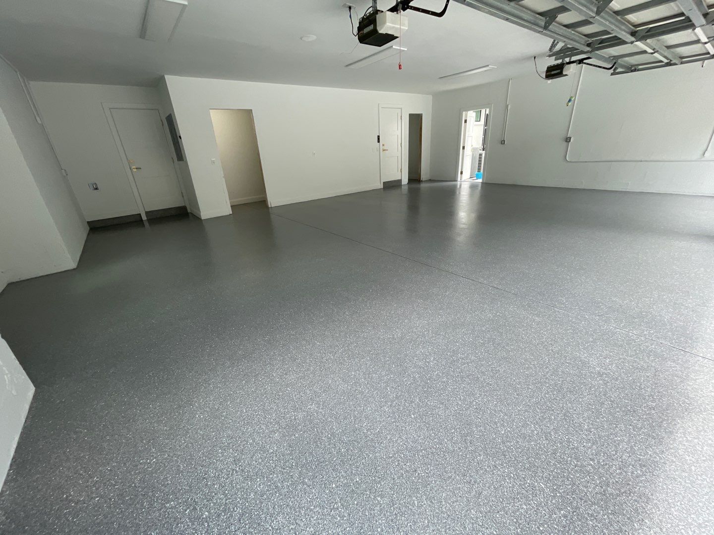 Garage Project in Gainesville, FL in Hybrid Turquoise  by Cross Creek Concrete Coatings