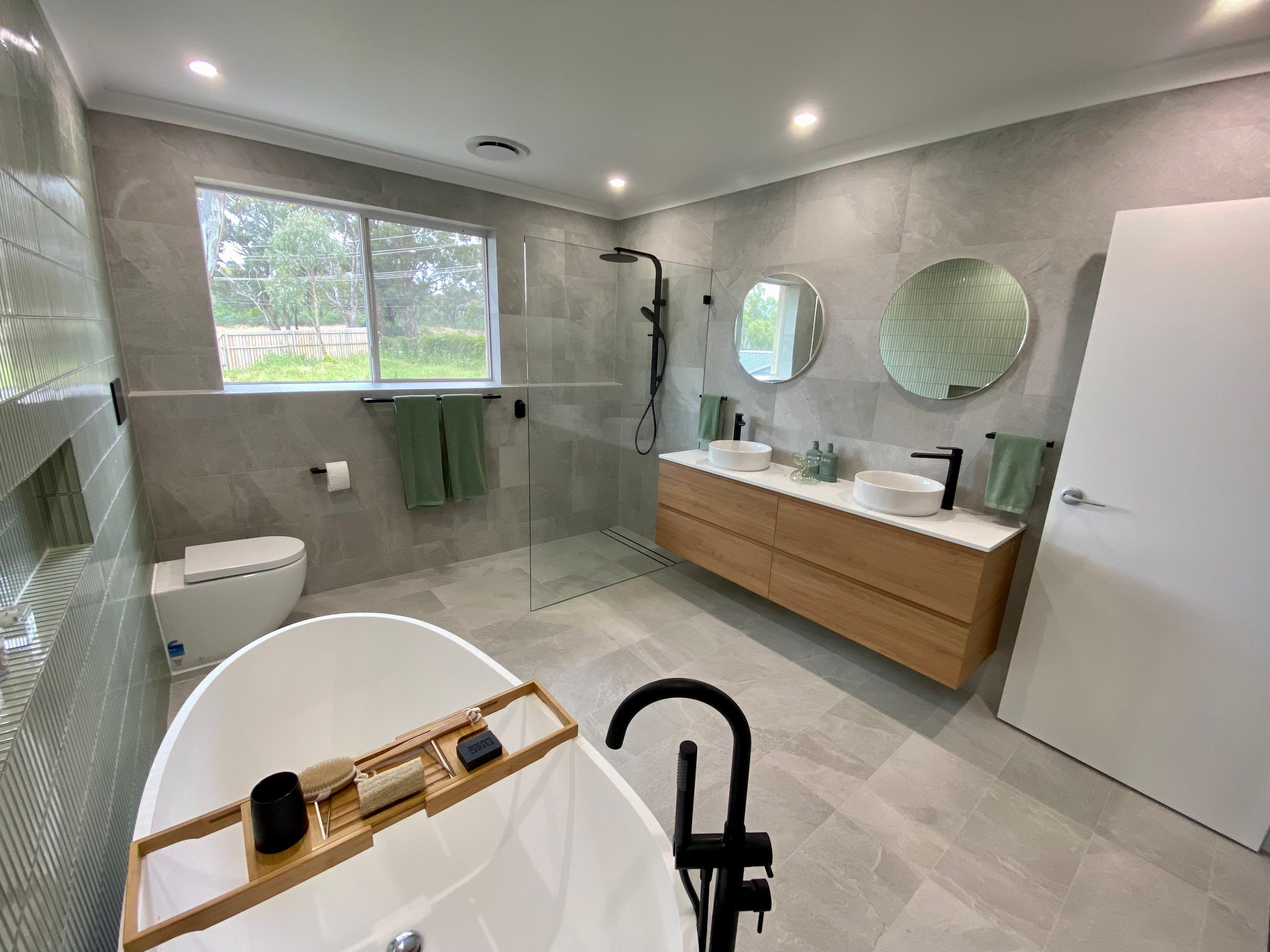 Bathroom Renovation using XROCK 36W White natural 300 x 600 by Re-seal Bathrooms