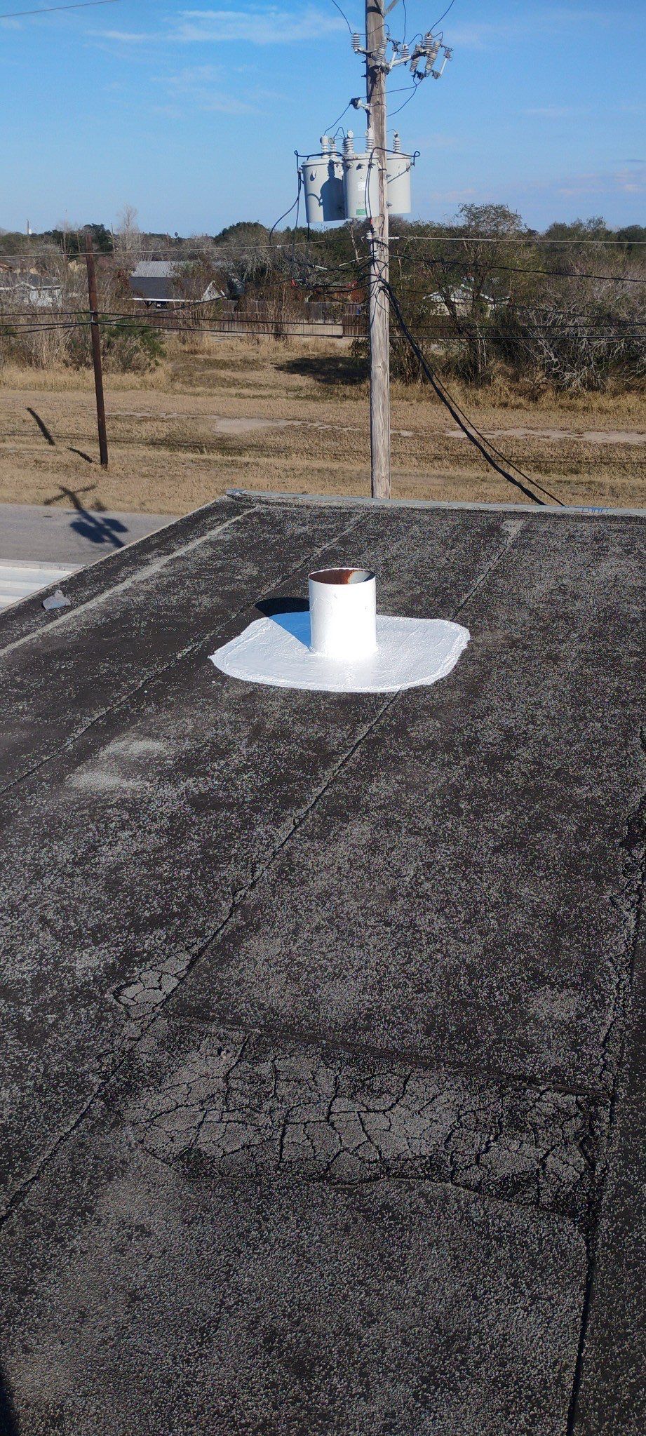 Commercial Silcone Roof Repair using Silcone Coating by Galvan Roofing and Construction
