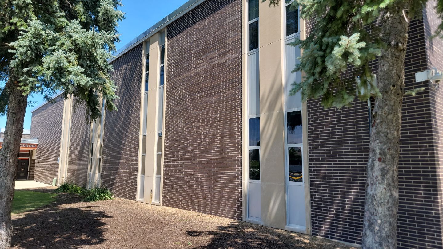 commercial pressure washing using Algaecide, soft wash soap by Northern Power Washing LLC.