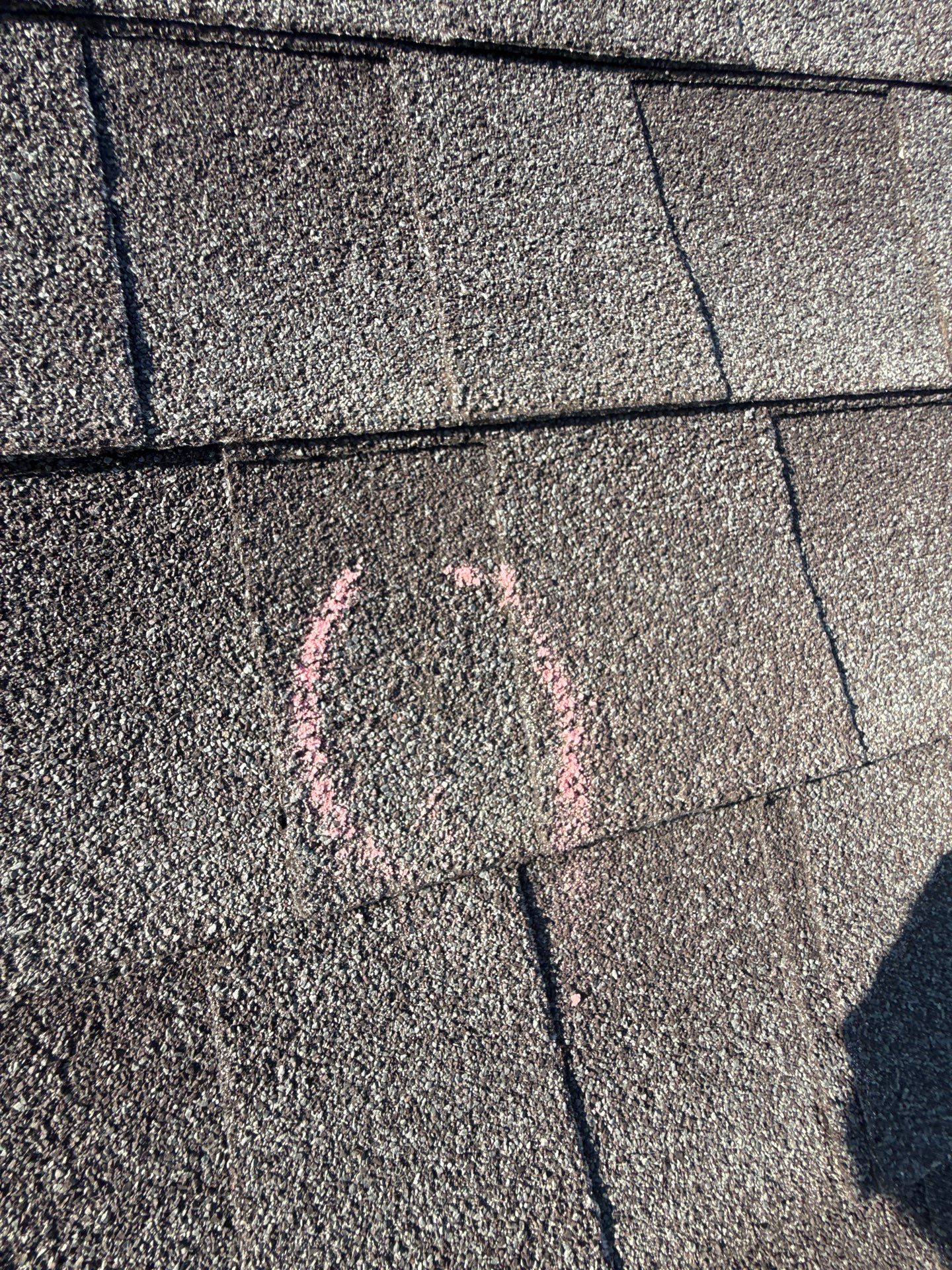 Hail Damage Roof Inspection in Oklahoma City, OK by McCann's Roofing and Construction