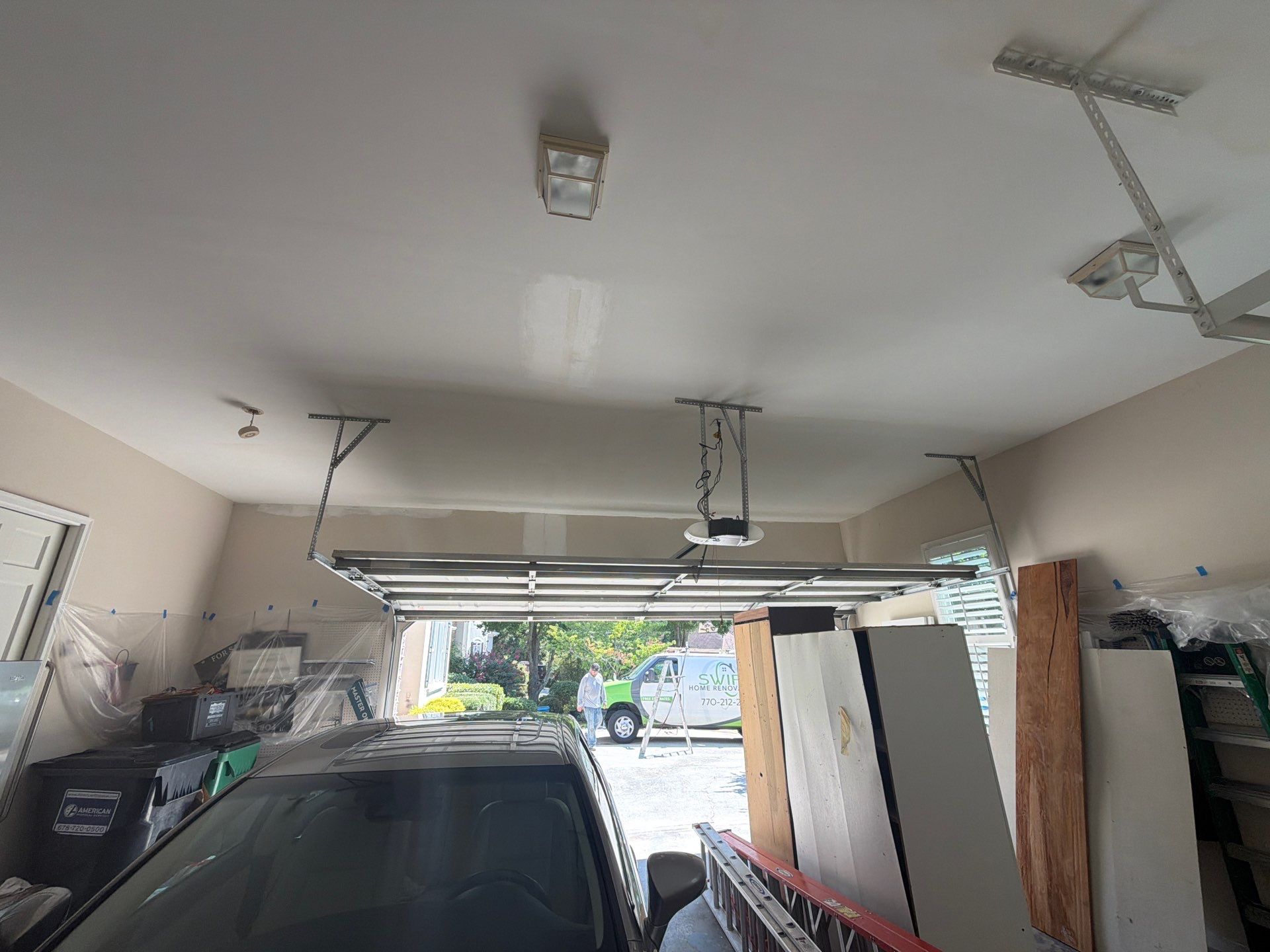 Multi-Story Stucco Home Exterior Painting and Garage Refresh in Marietta by Swift Home Renovations 