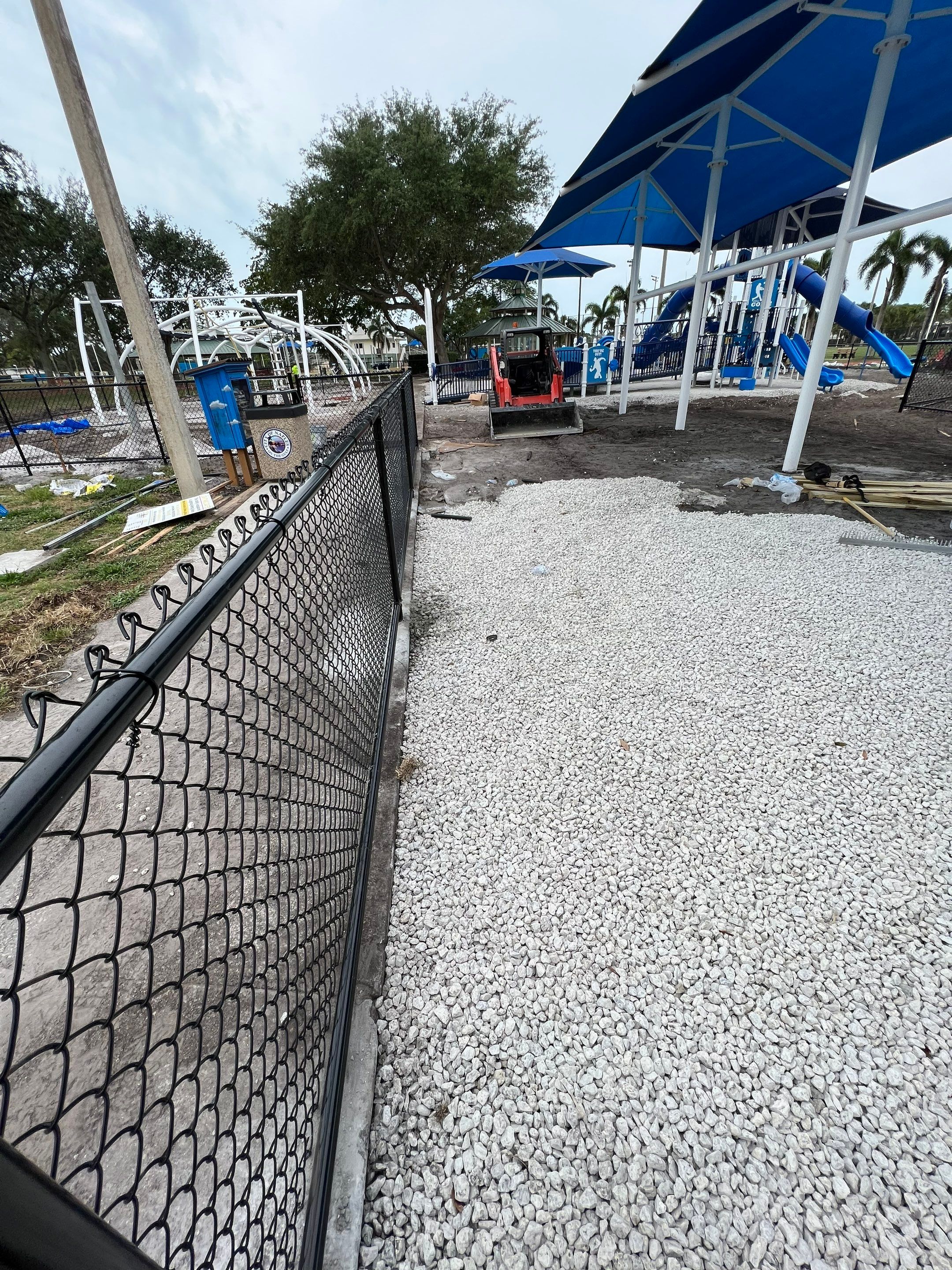 Vinyl Coated Chain-link fence for the City of Naples around Fleischmann Park Playground.  by Asap fence and gates, LLC