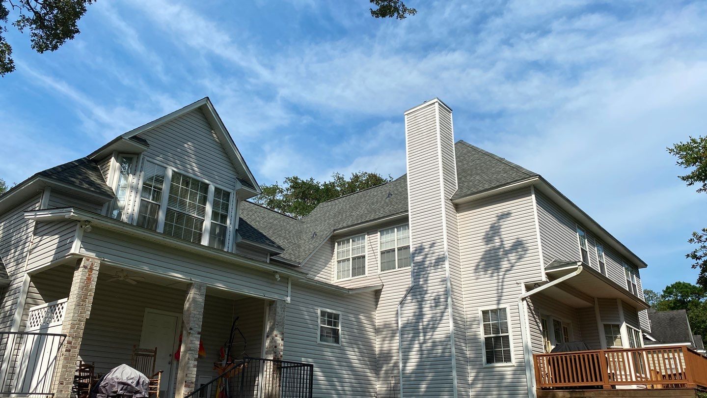 Residential Roofing Installation using Roof Replacement by American Roofing & Construction LLC