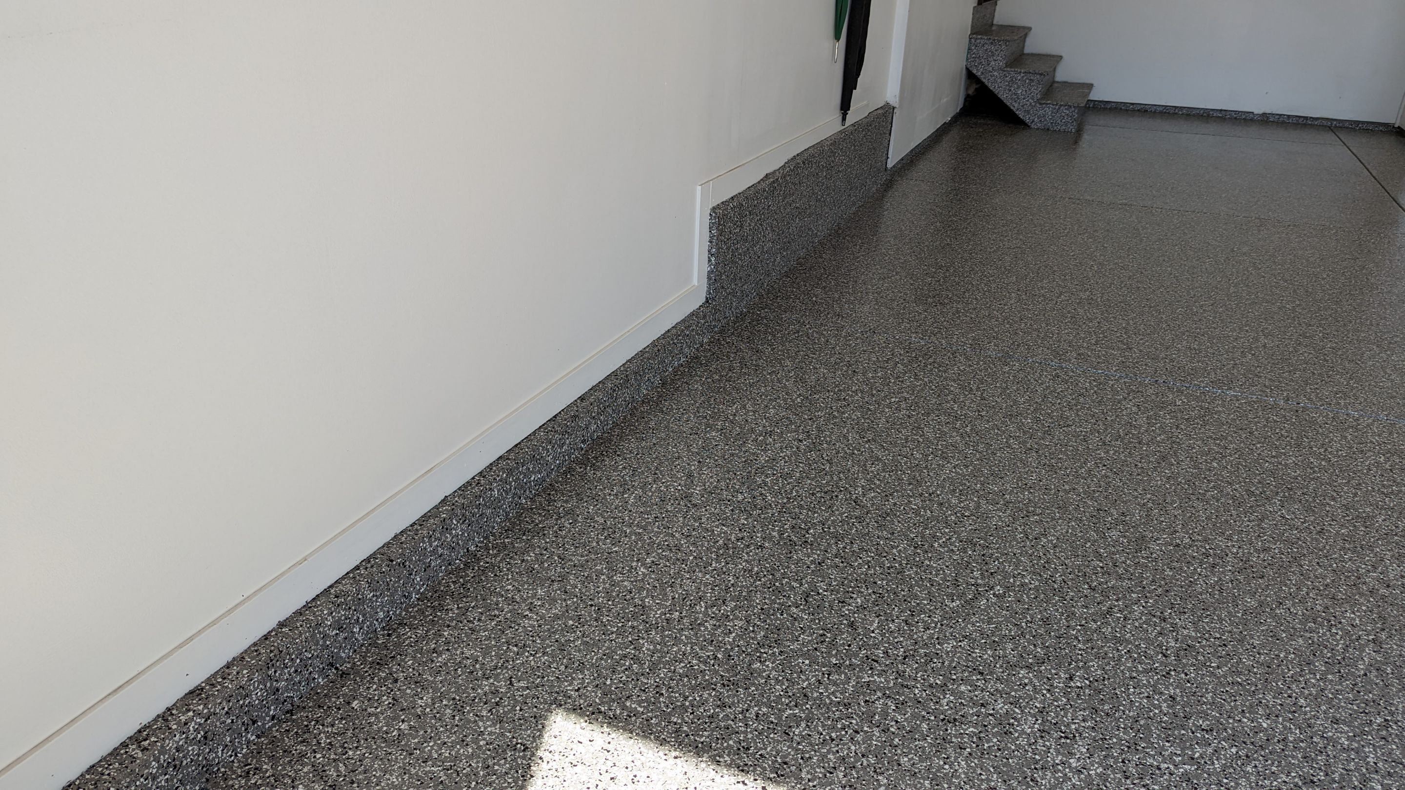 Garage Transformation using Smoke Colorway by Croc Coatings, LLC