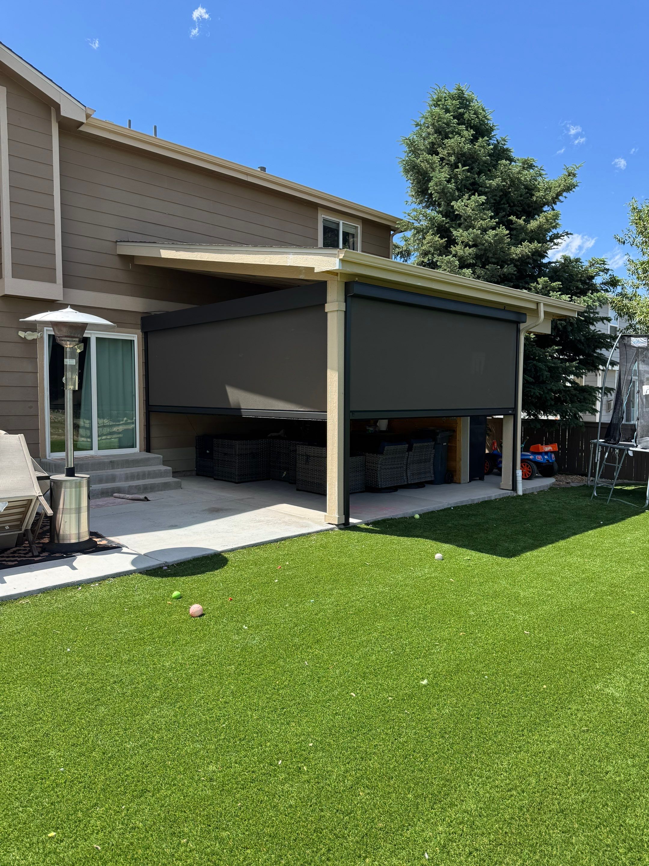 Motorized MagnaTrack Privacy Screen Installation on Castle Rock Patio by Outdoor Solutions Colorado