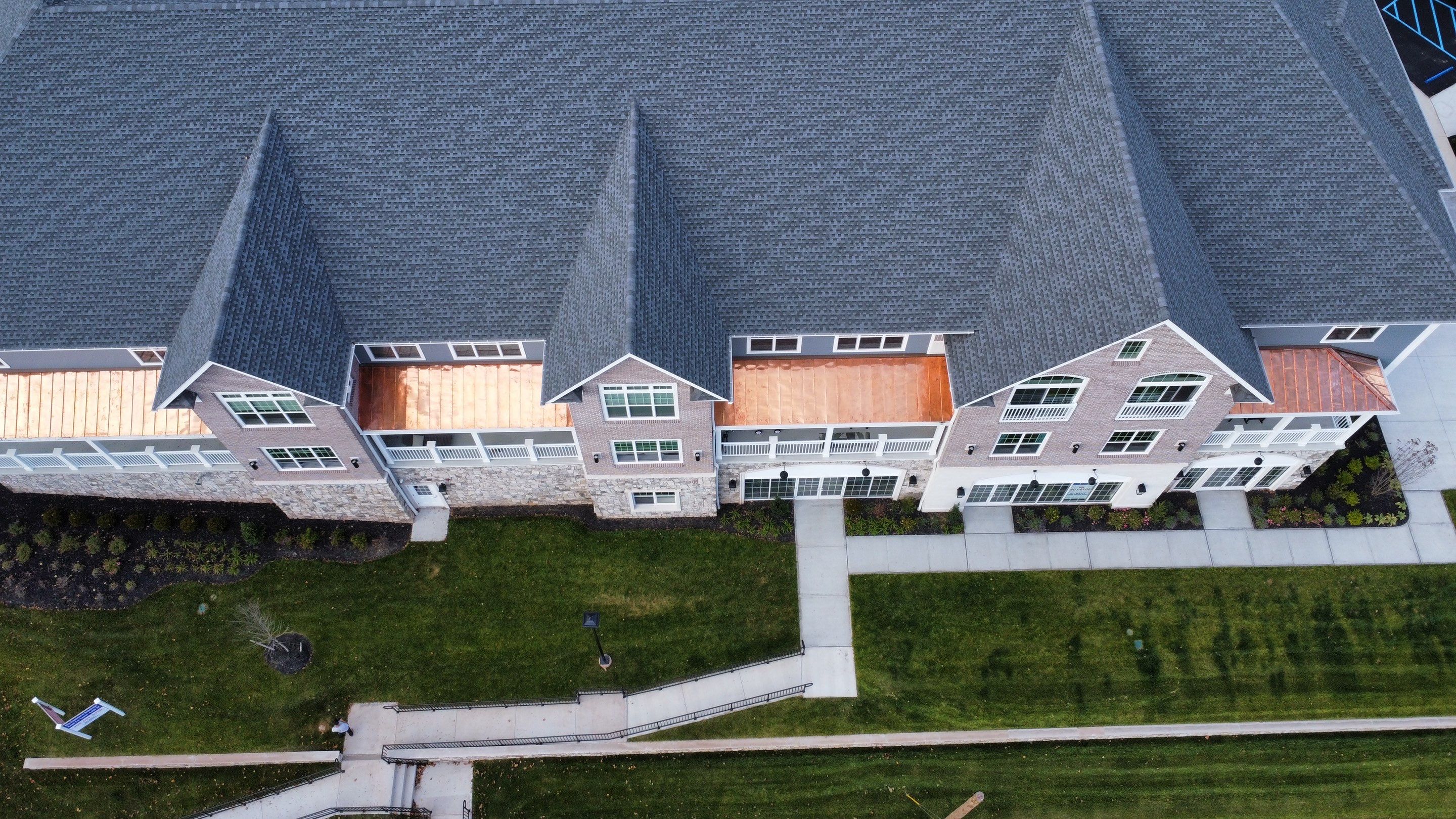 Standing Seam Metal Roof using Copper by CMNG LLC