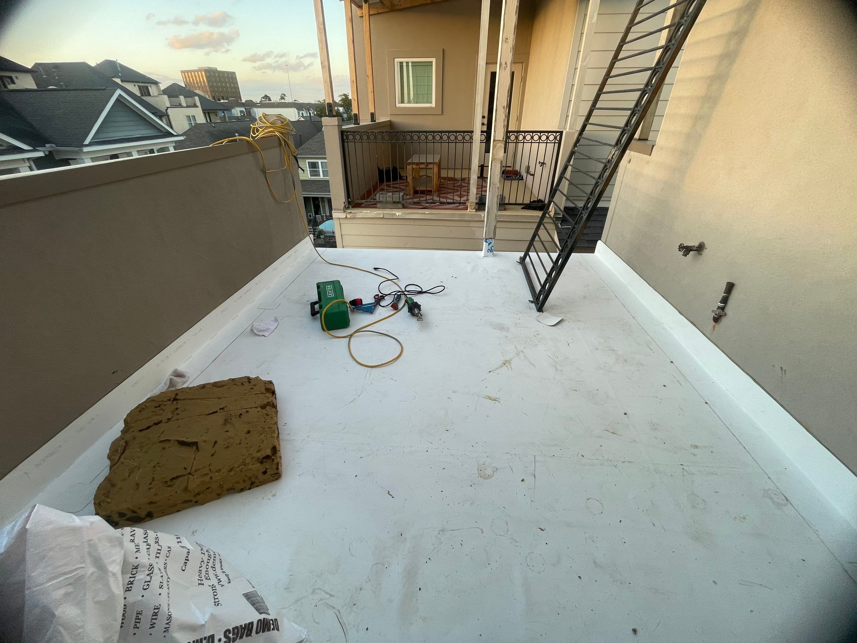 Rooftop Patio Installation by Associates Roofing Unlimited 