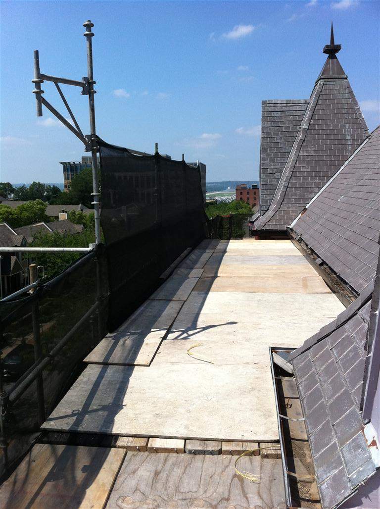 Historic Building ROOF REPLACEMNT with GAF TruSlate  on steep slop and Versico 60mil TPO on flat roof by Gorilla Exteriors Contracting, LLC