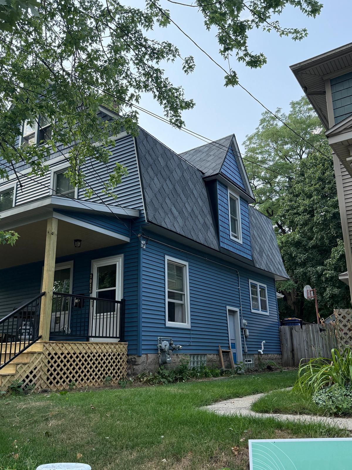 SIDING, DECK AND NEW PORCH  by Avalon Roofing and Exteriors