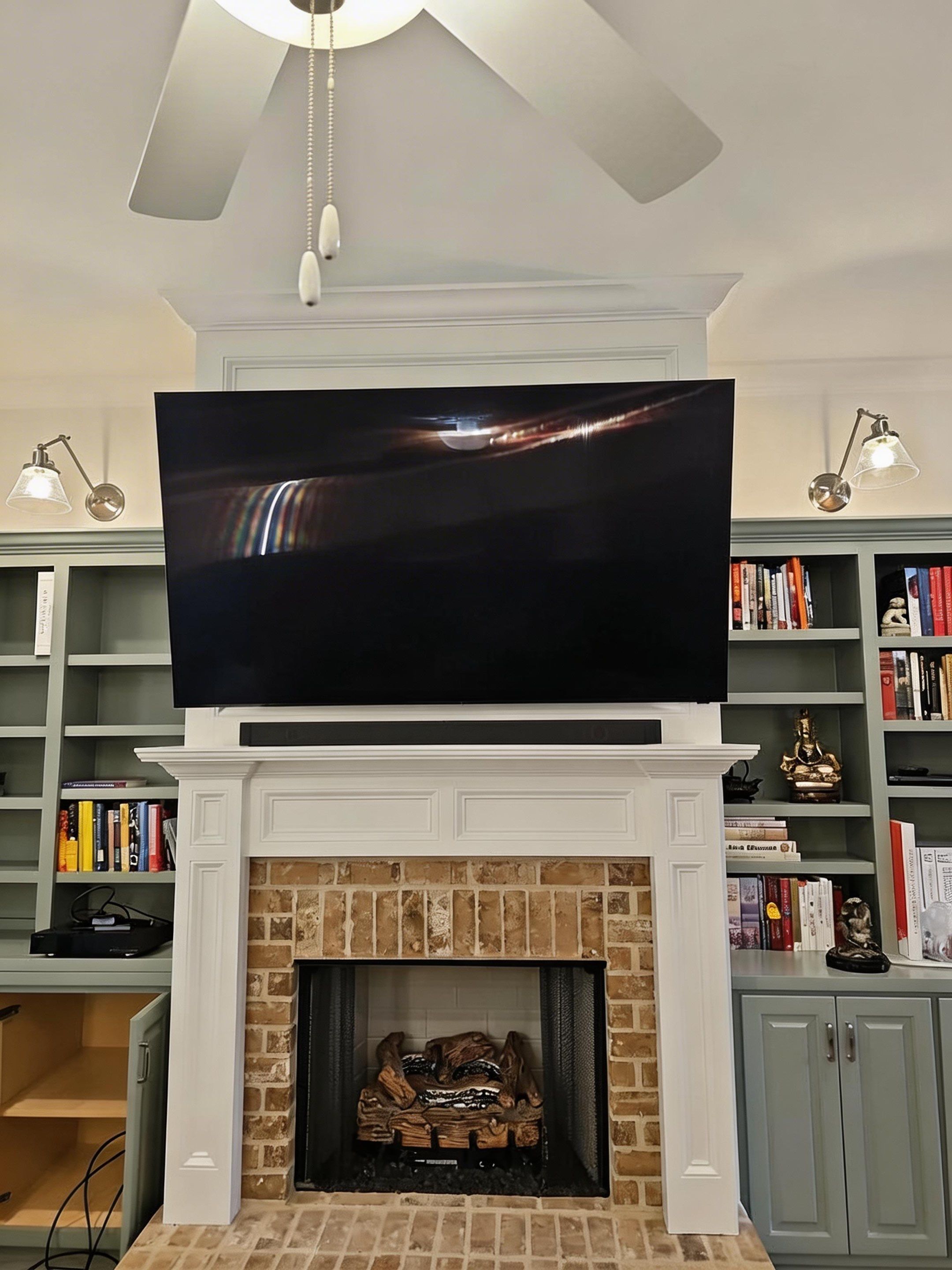 Fireplace TV Mounting Projects by Hangman Mounting & Installation 