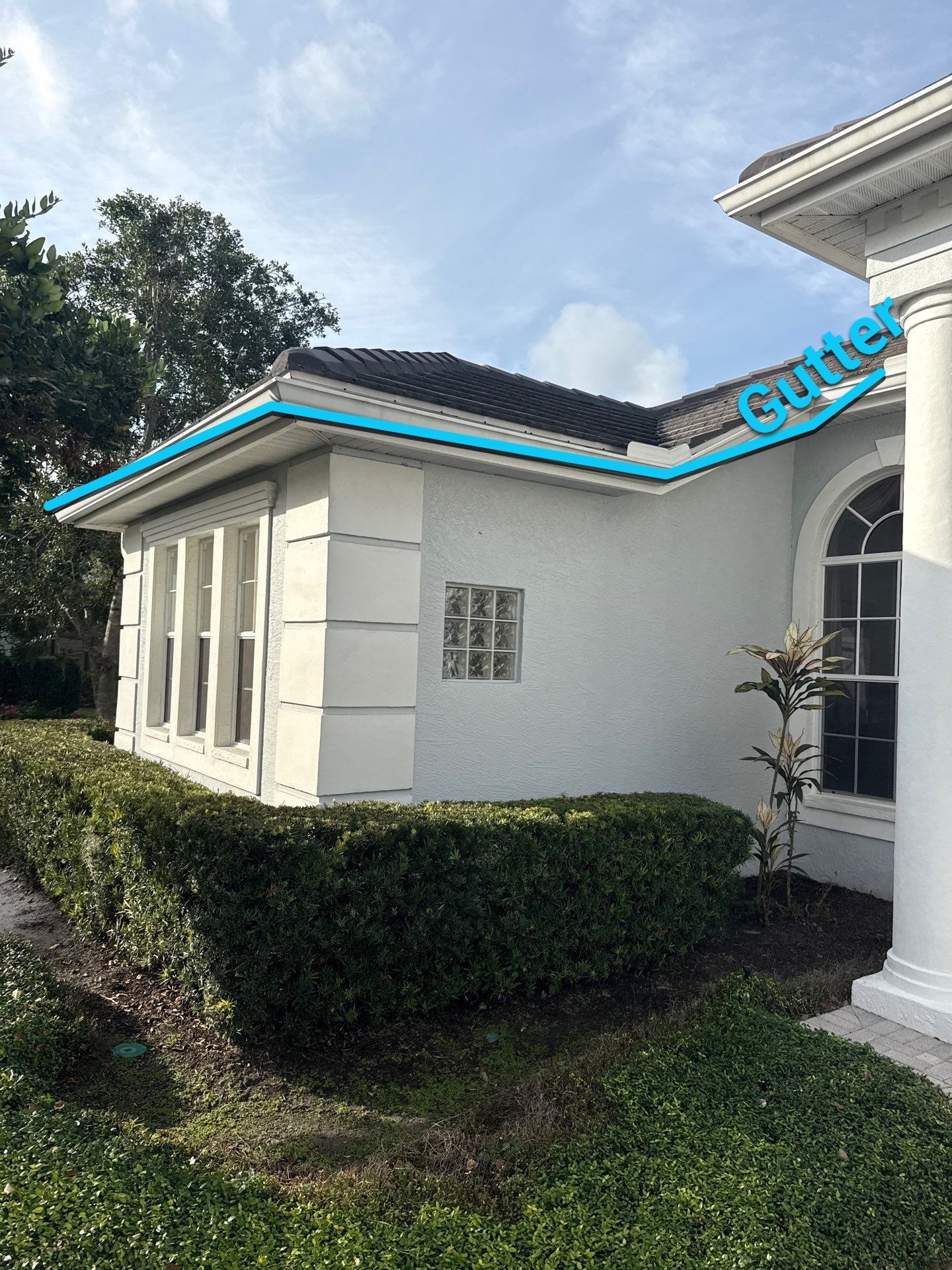 White Down Spouts using downspouts and White Seamless Gutters in Sarasota FL by Gutter Professors