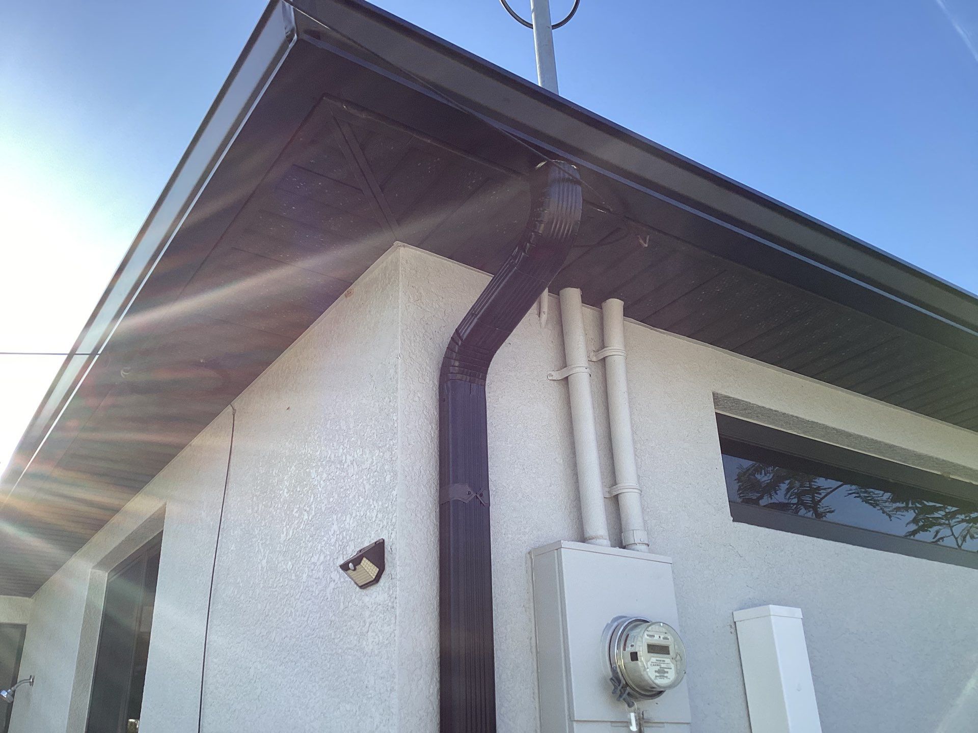 Black Seamless Gutters using 6 Inch Seamless Gutters in Cape Coral FL by Gutter Professors