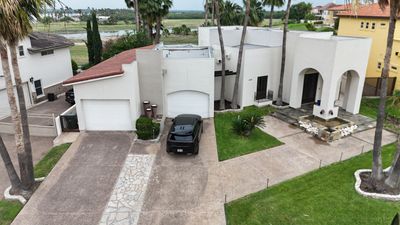 Residential Clay Tile and Flat Membrane Roof Repair in Laredo