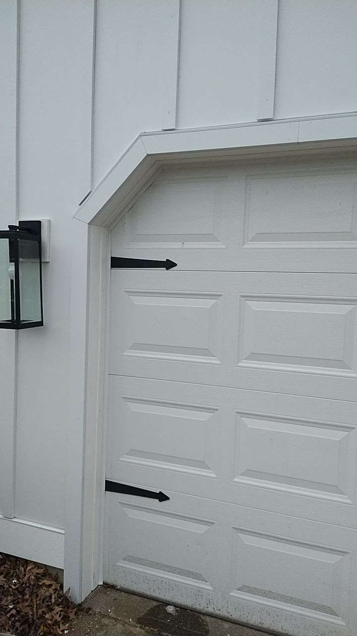 James Hardie Siding  using James Hardie Board and Batten, White by Absolute Roofing and Construction
