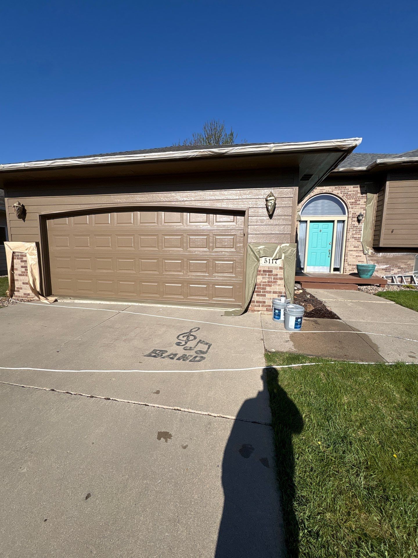 Exterior Painting and Wood Trim Replacement in Sioux Falls by Select Painting, Coatings & Garage Cabinets