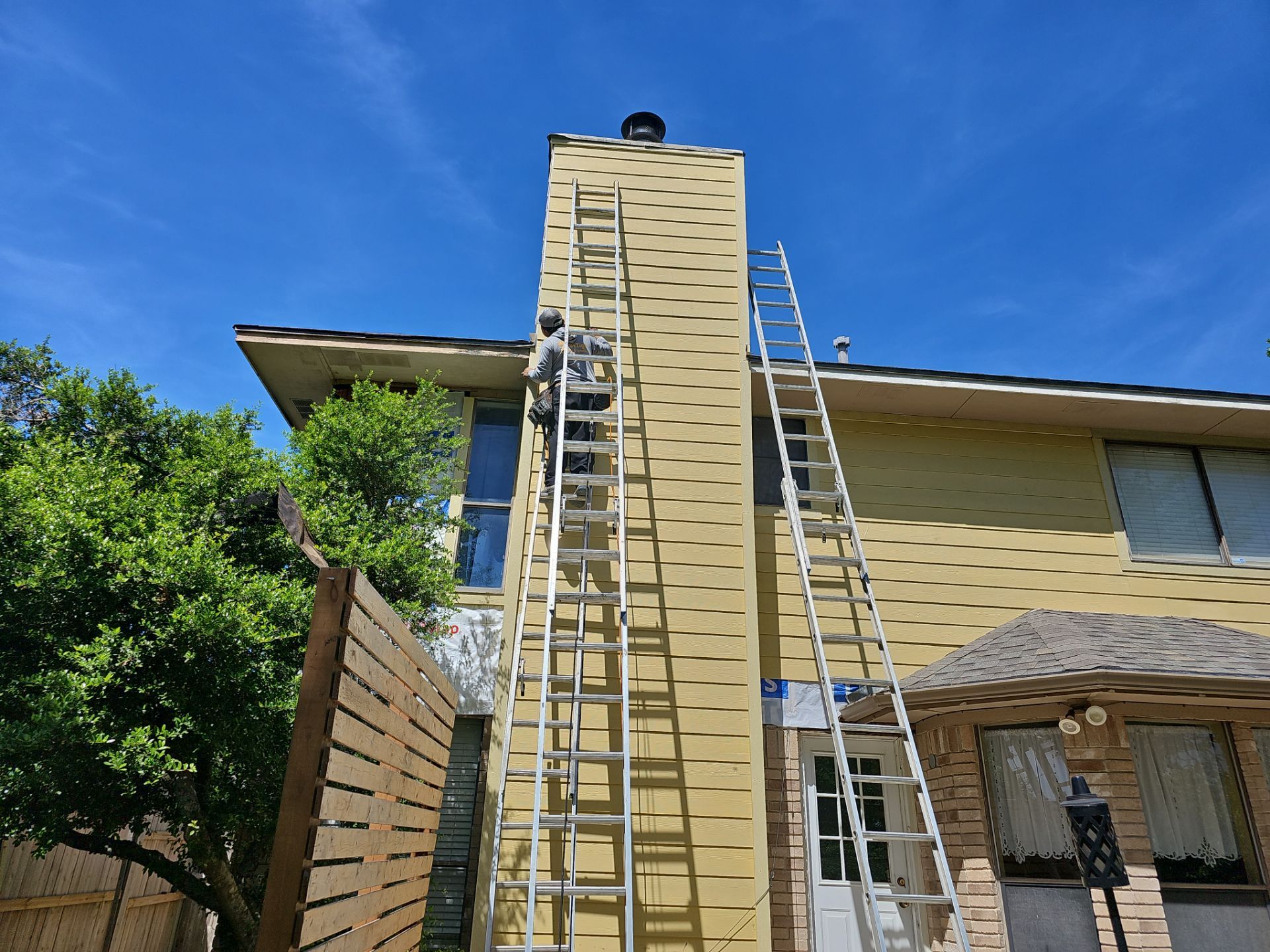Siding Makeover  by DeZign Roofing & Exteriors
