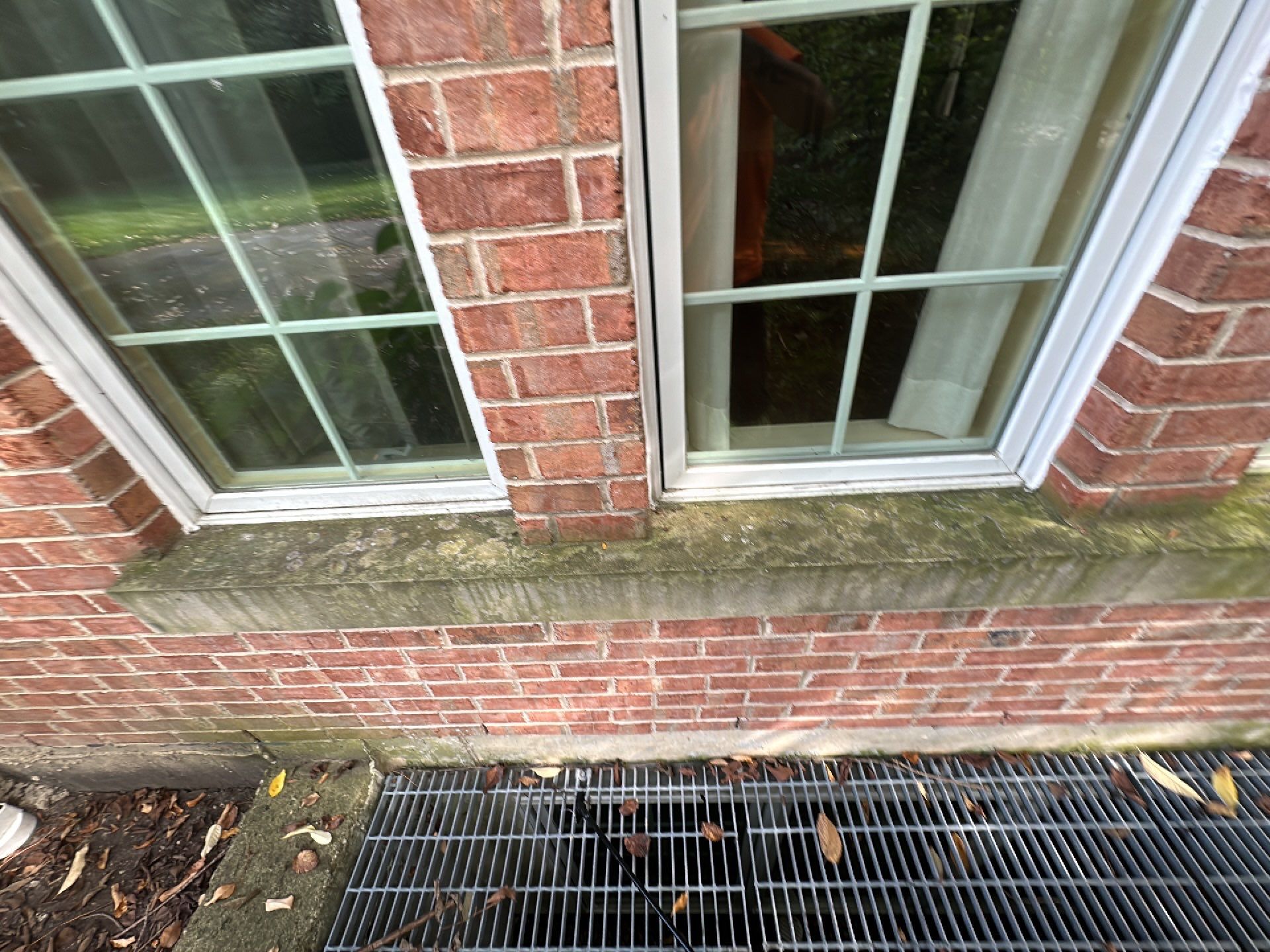 natural stone using Algaecide, soft wash soap by Northern Power Washing LLC.