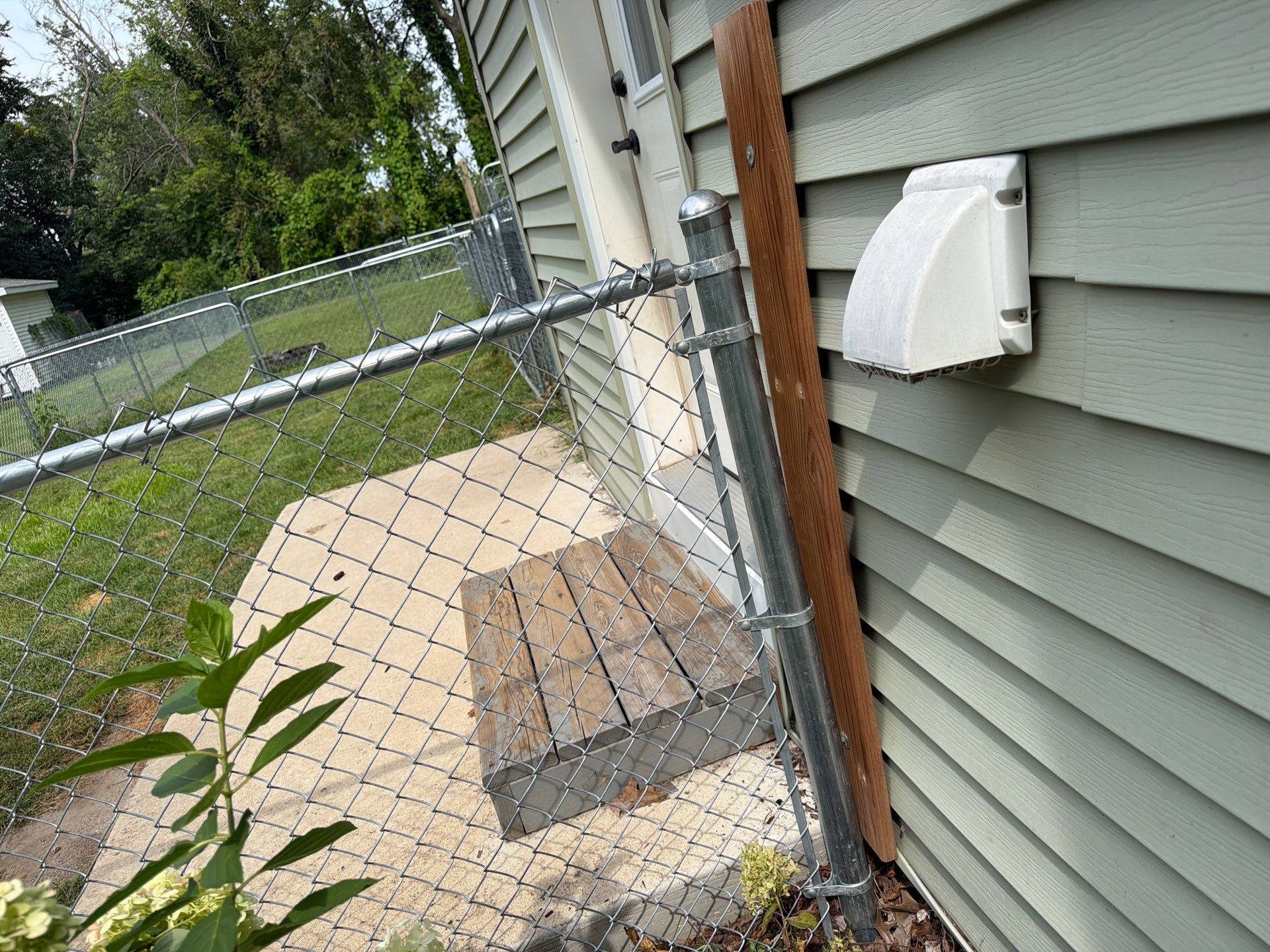 Galvanized Chain Link Fence and Gate Installation in La Porte City by Perfect Picket Fence and Stain