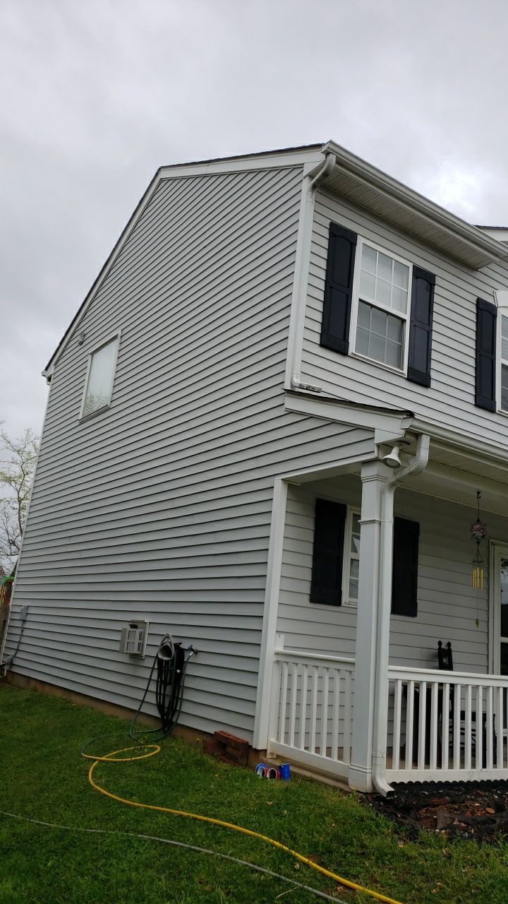 House Wash using cleaner by Power Wash Masters LLC
