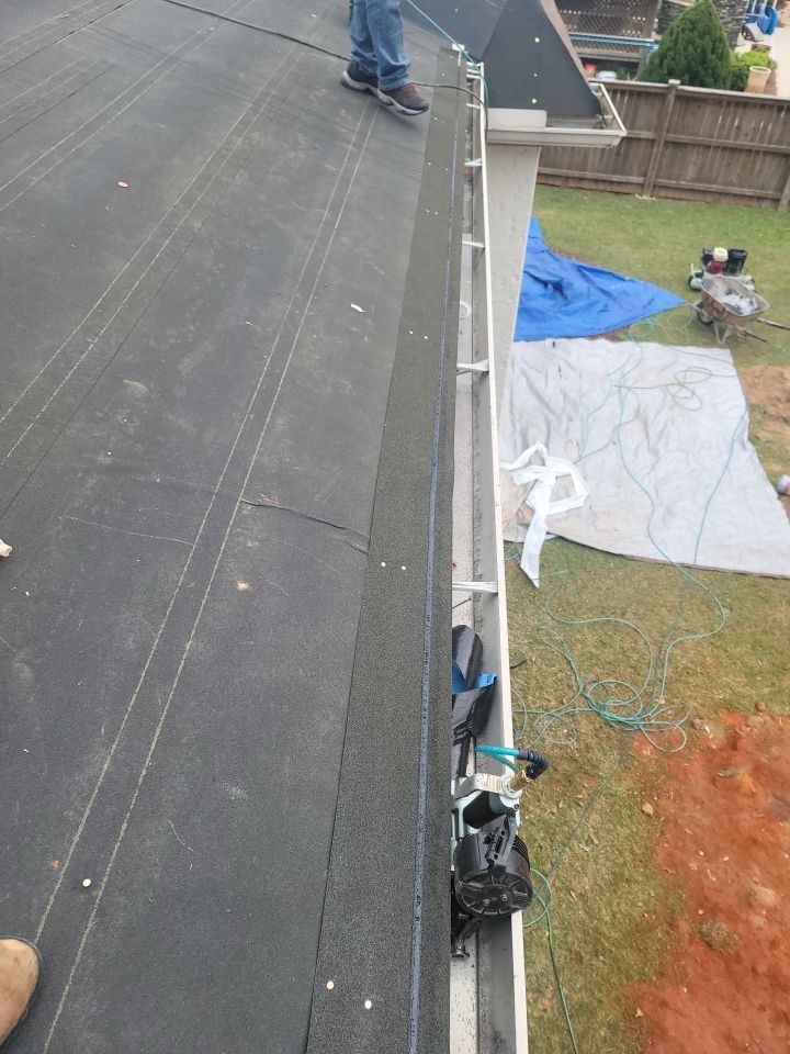 Residential Roofing Installation using Roof Replacement by American Roofing & Construction LLC