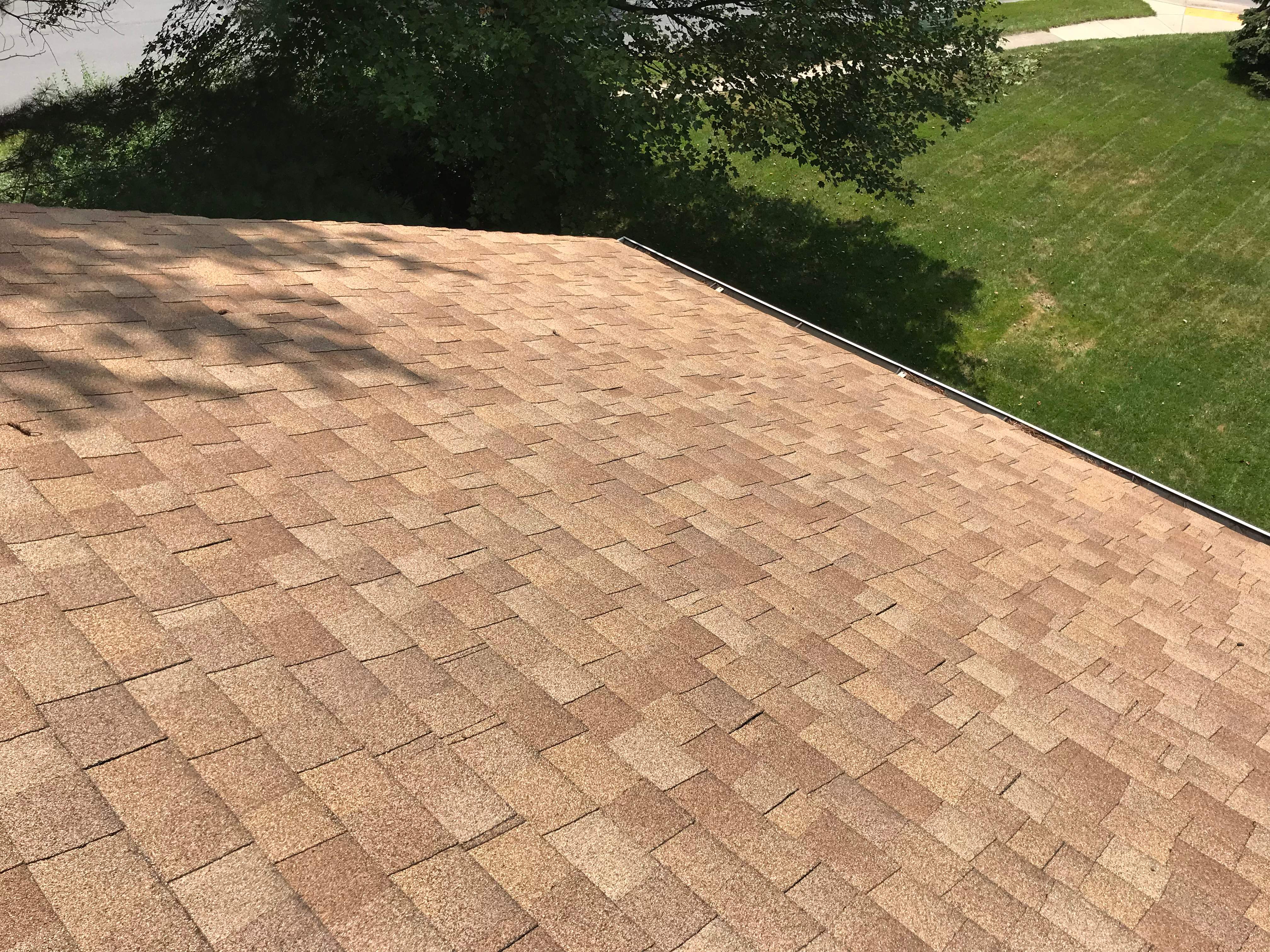 Residential Roofing Installation using Landmark Shingles Color Weatherwood by Alpha Design Services