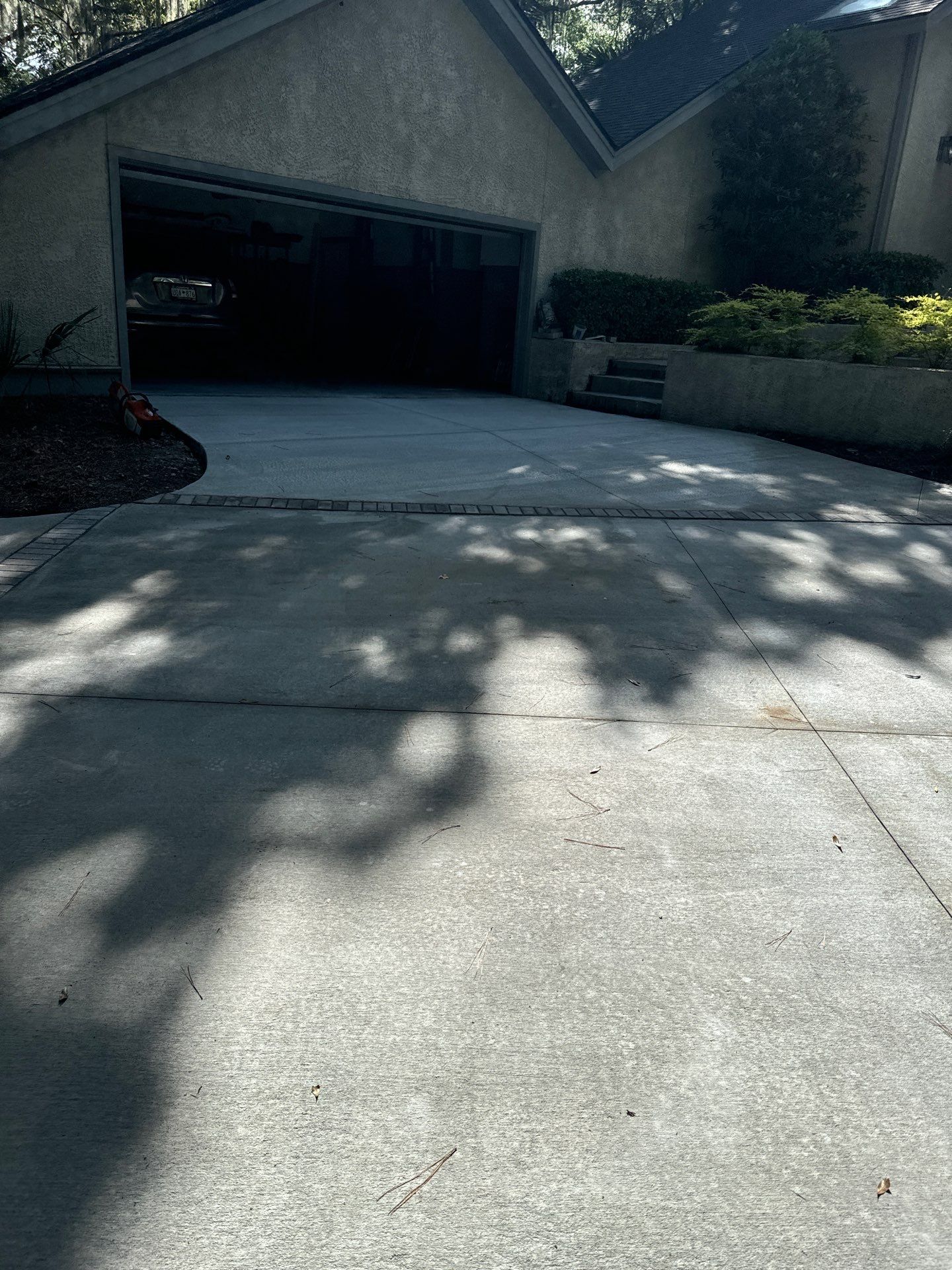 Hilton Head Island Concrete Driveway Replacement with Decorative Paver Borders by Lowcountry Scapes, LLC