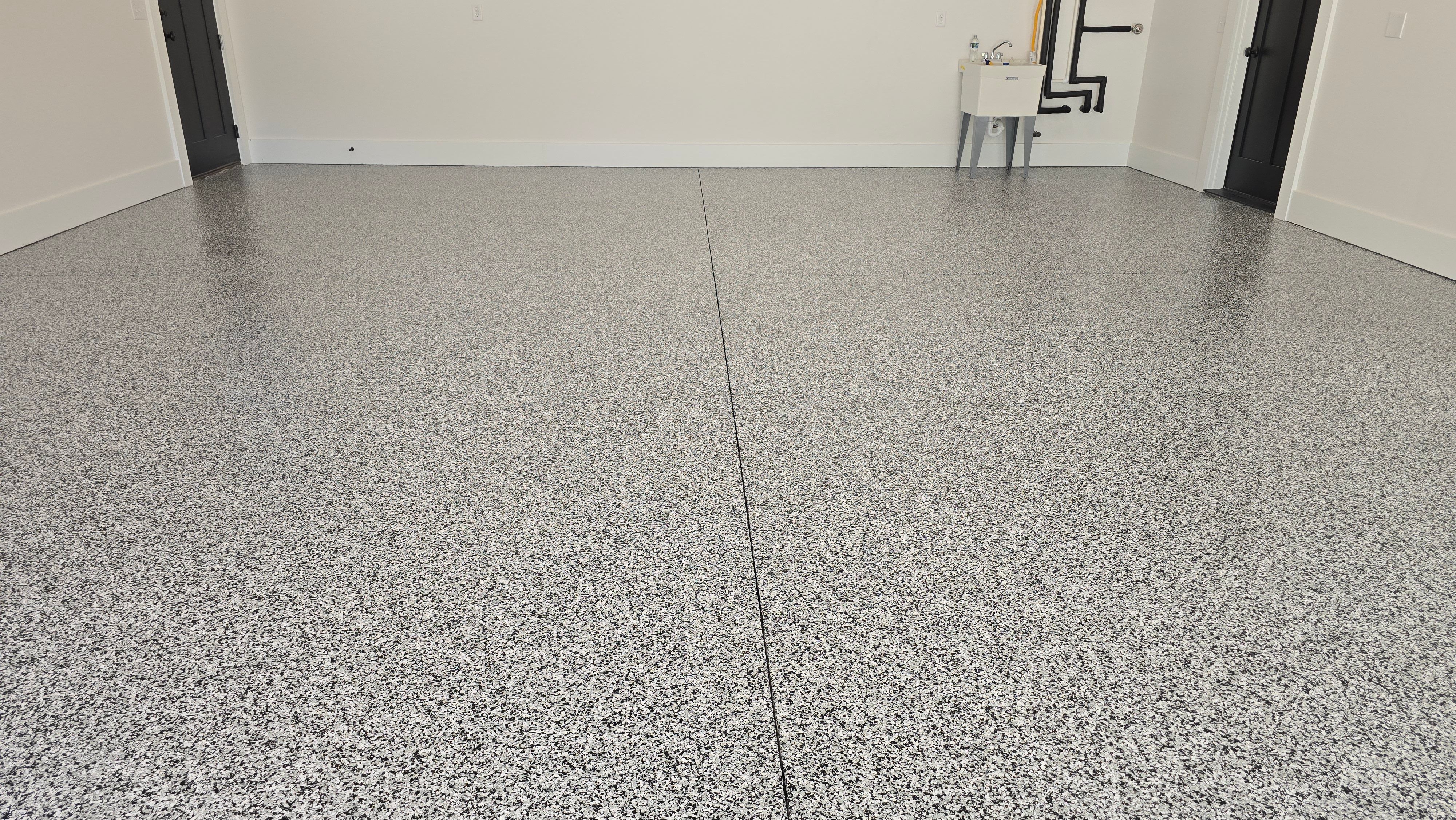 Garage using Domino by Elite Floor Solutions