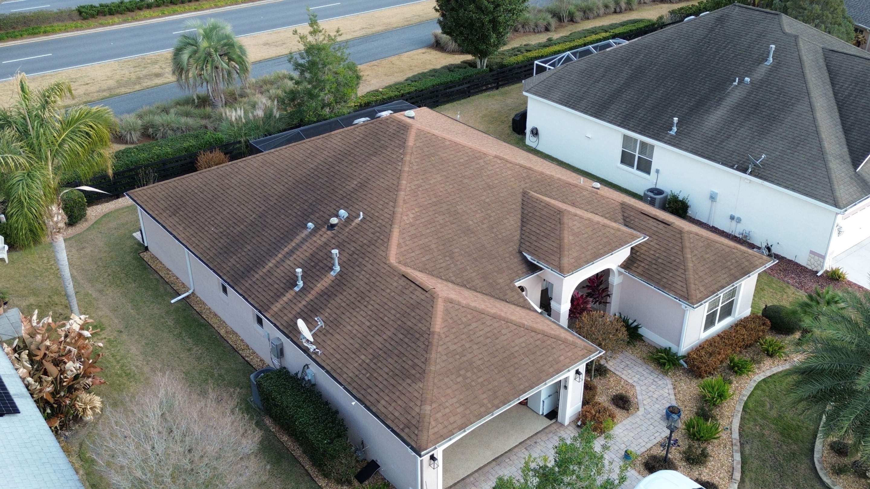 Before and after drone pictures in The Villages FL by Gold Key Roofing