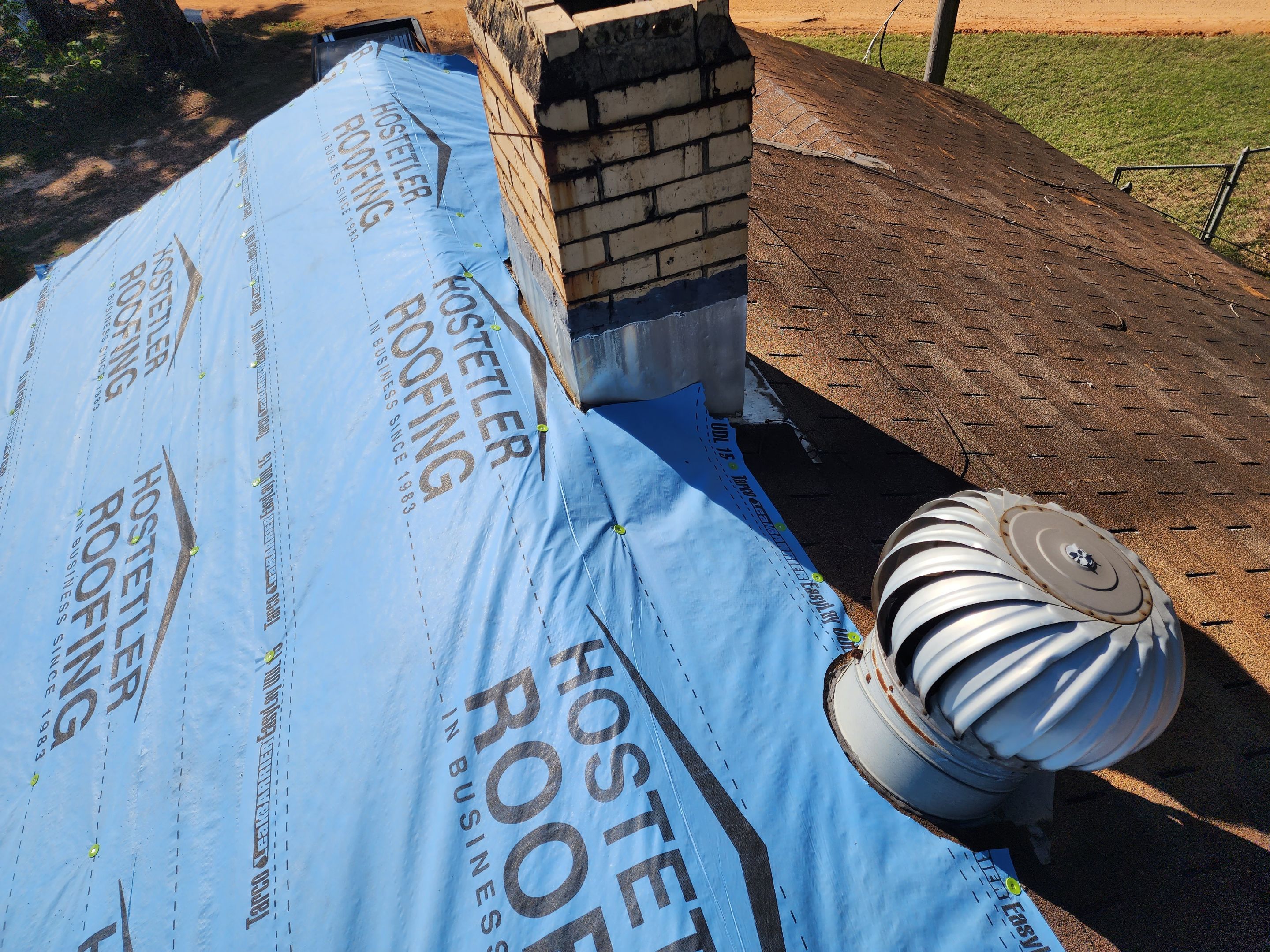 Residential Roofing Repair using Malarkey Highlander: Natural Wood by Hostetler Roofing