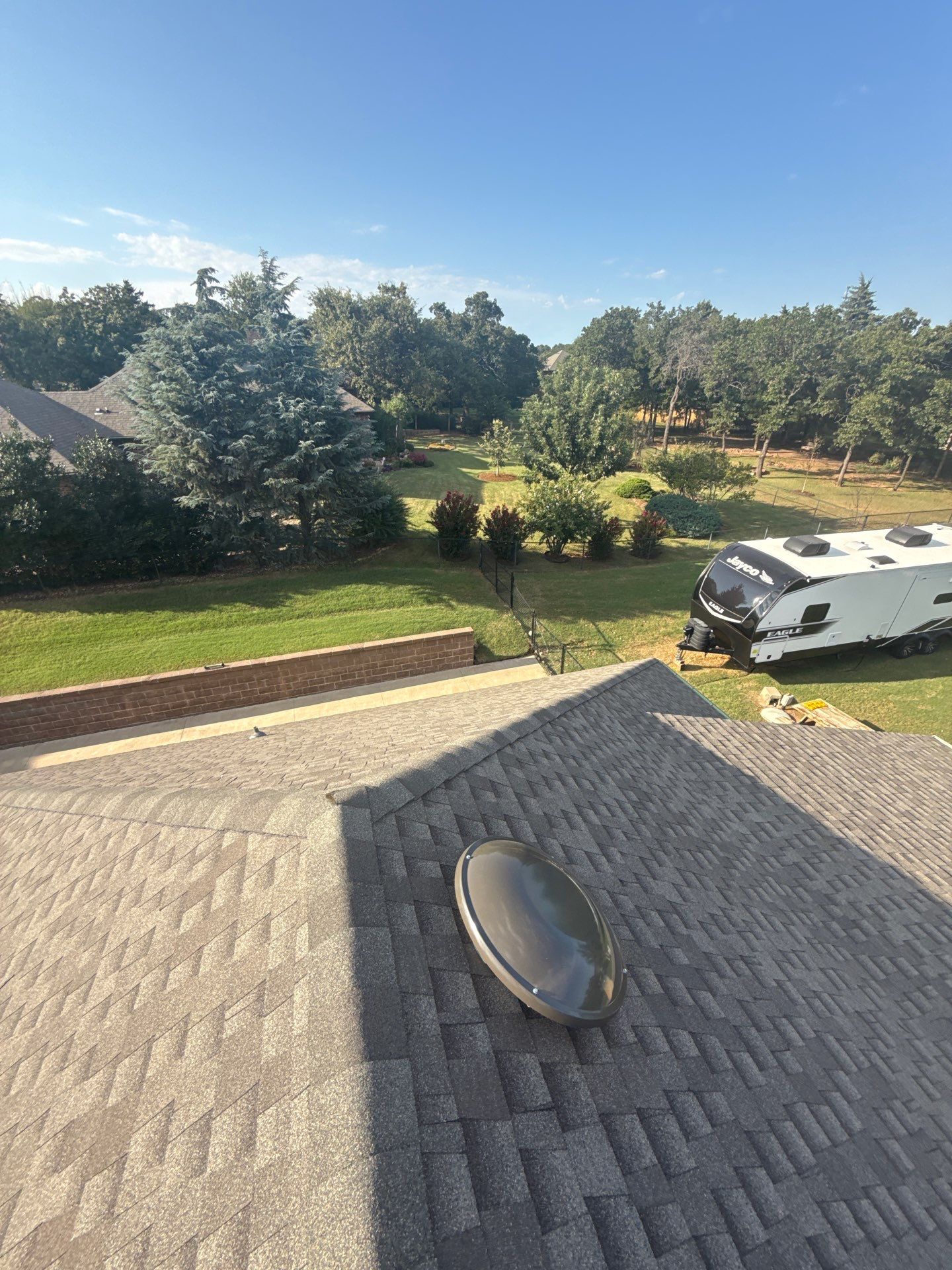 roof replacement in Guthrie by McCann's Roofing and Construction