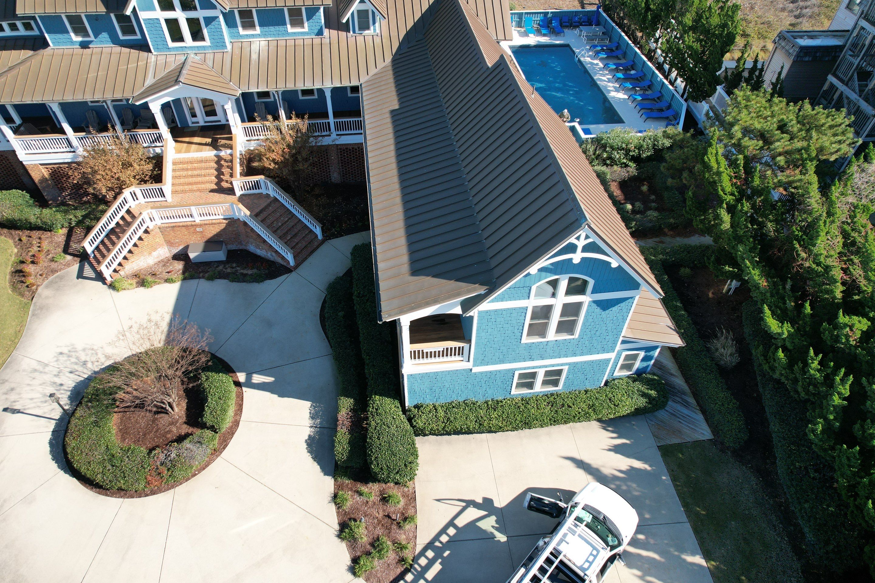 Large Metal Roof Transformation by Gallop Roofing & Remodeling, Inc.