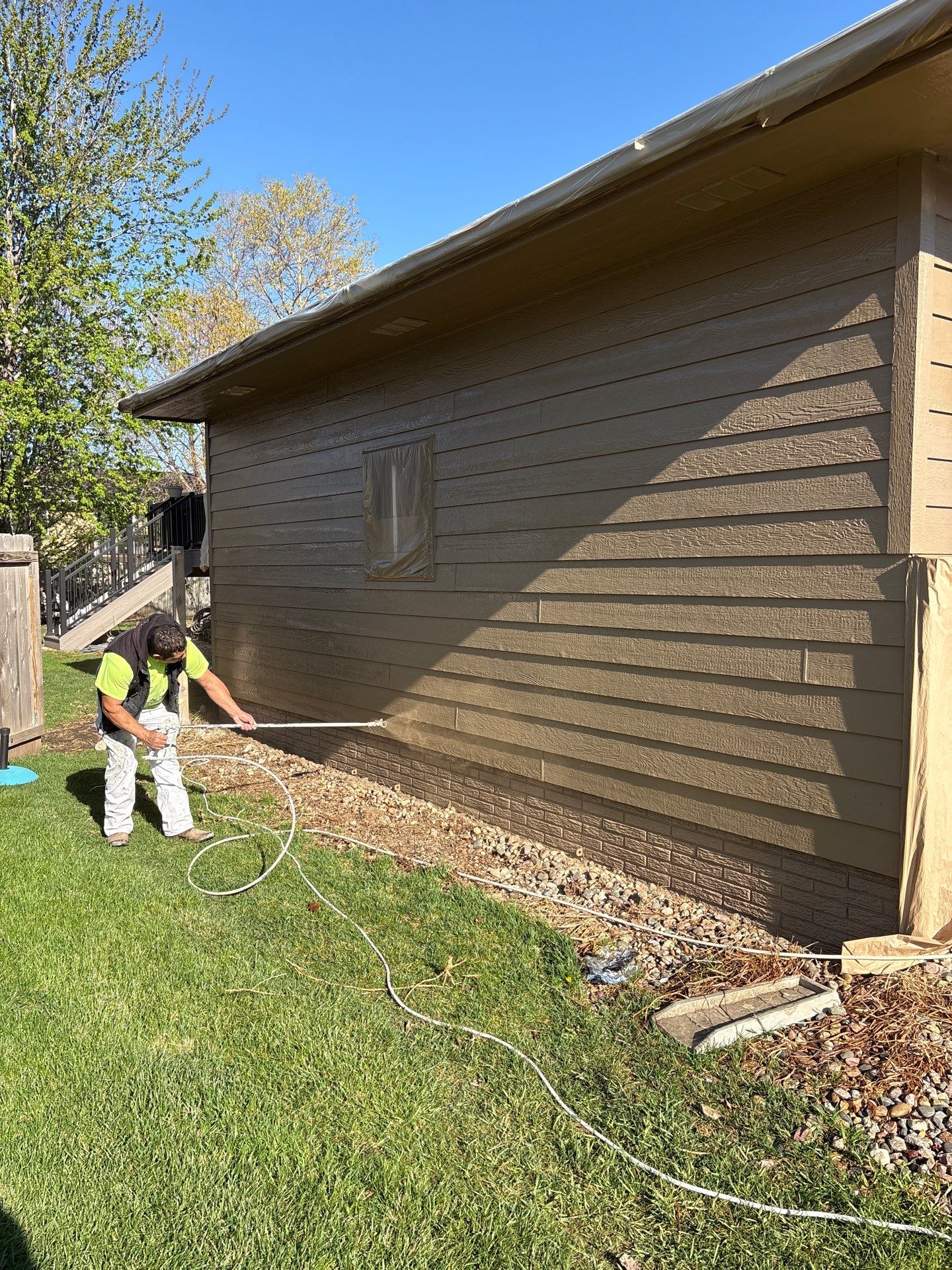 Exterior Painting and Wood Trim Replacement in Sioux Falls by Select Painting, Coatings & Garage Cabinets