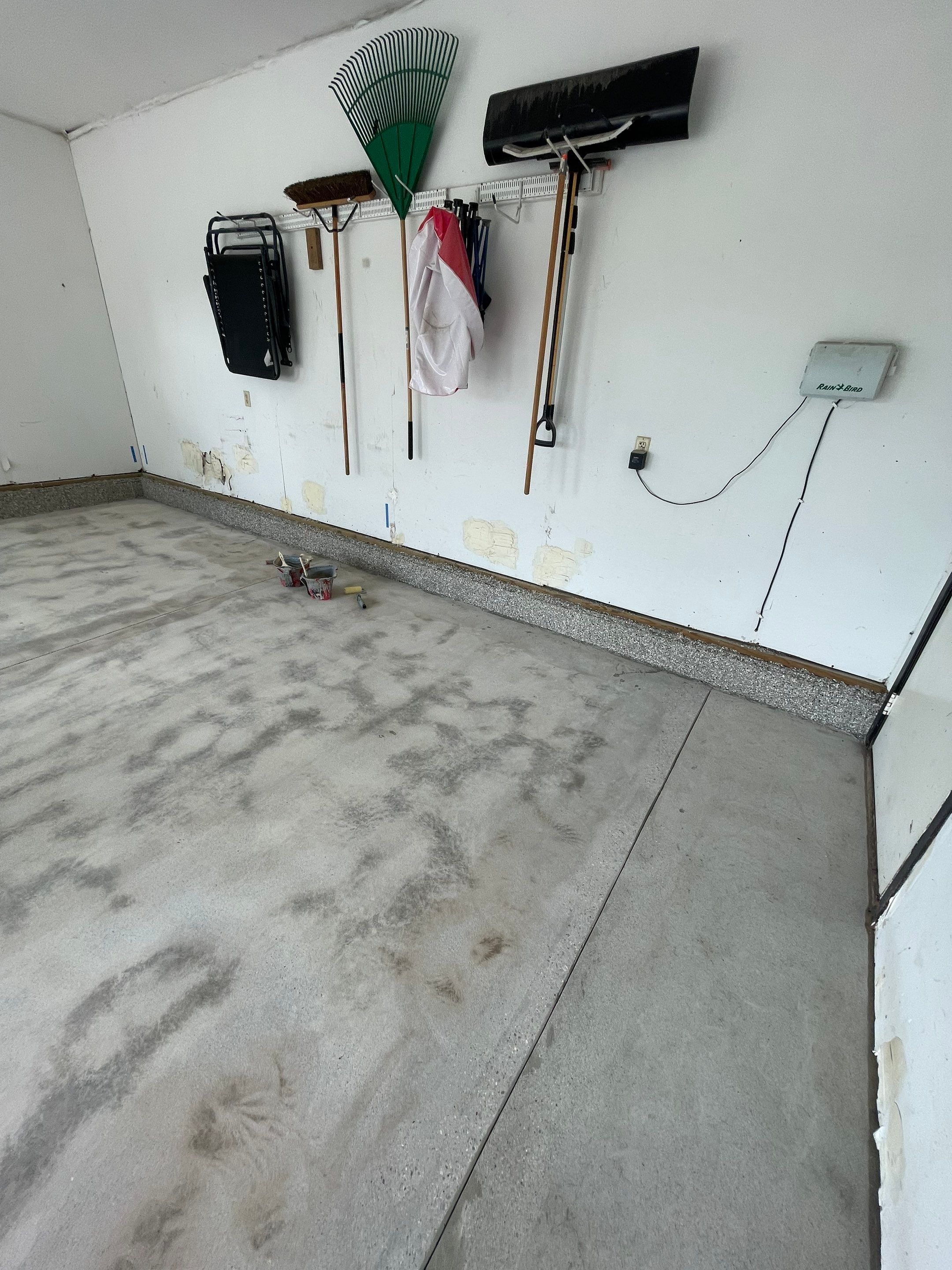 Hartford Residential Garage Floor Transformation With Decorative Chip Coating by Select Painting, Coatings & Garage Cabinets