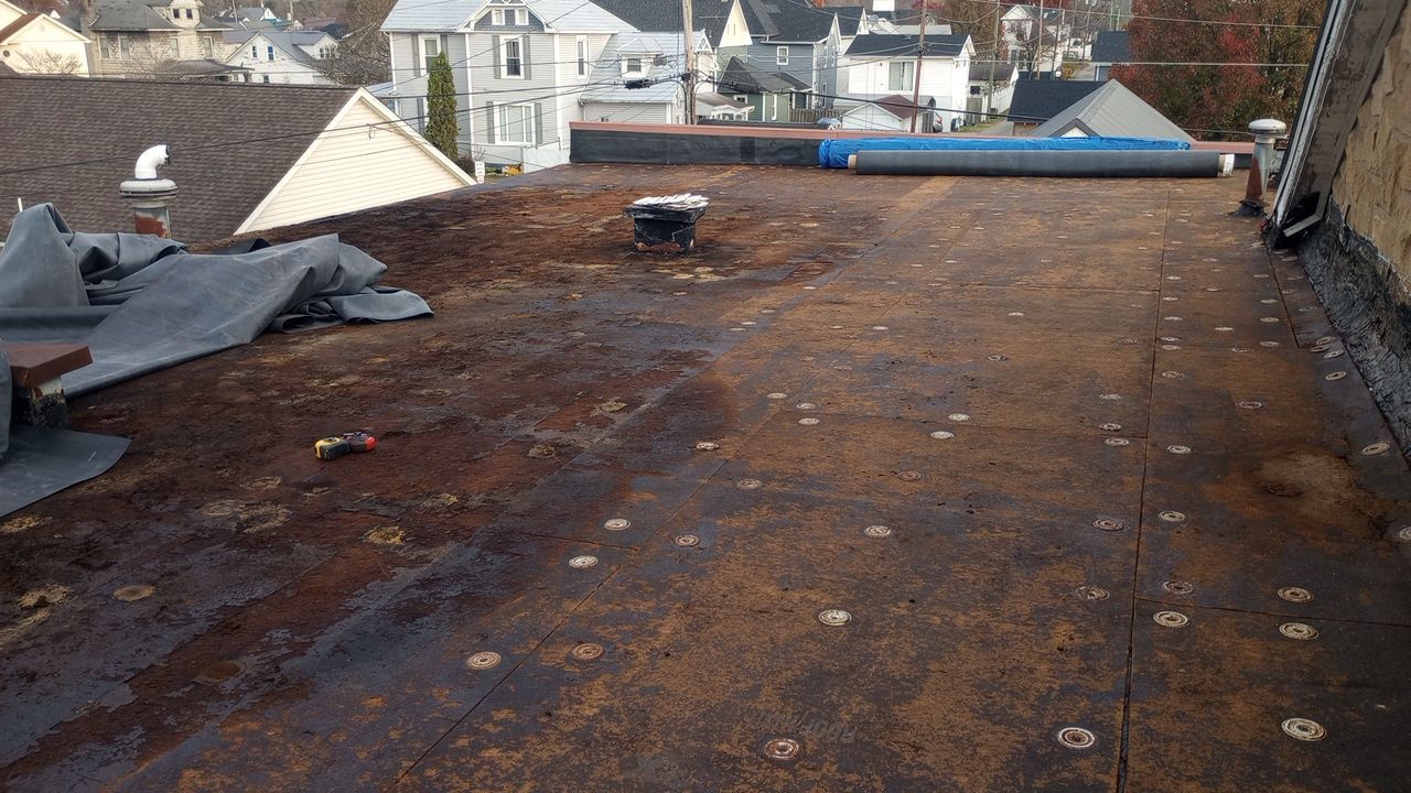 Commercial Roofing Installation using Performance Shingles by Mr. Roofer