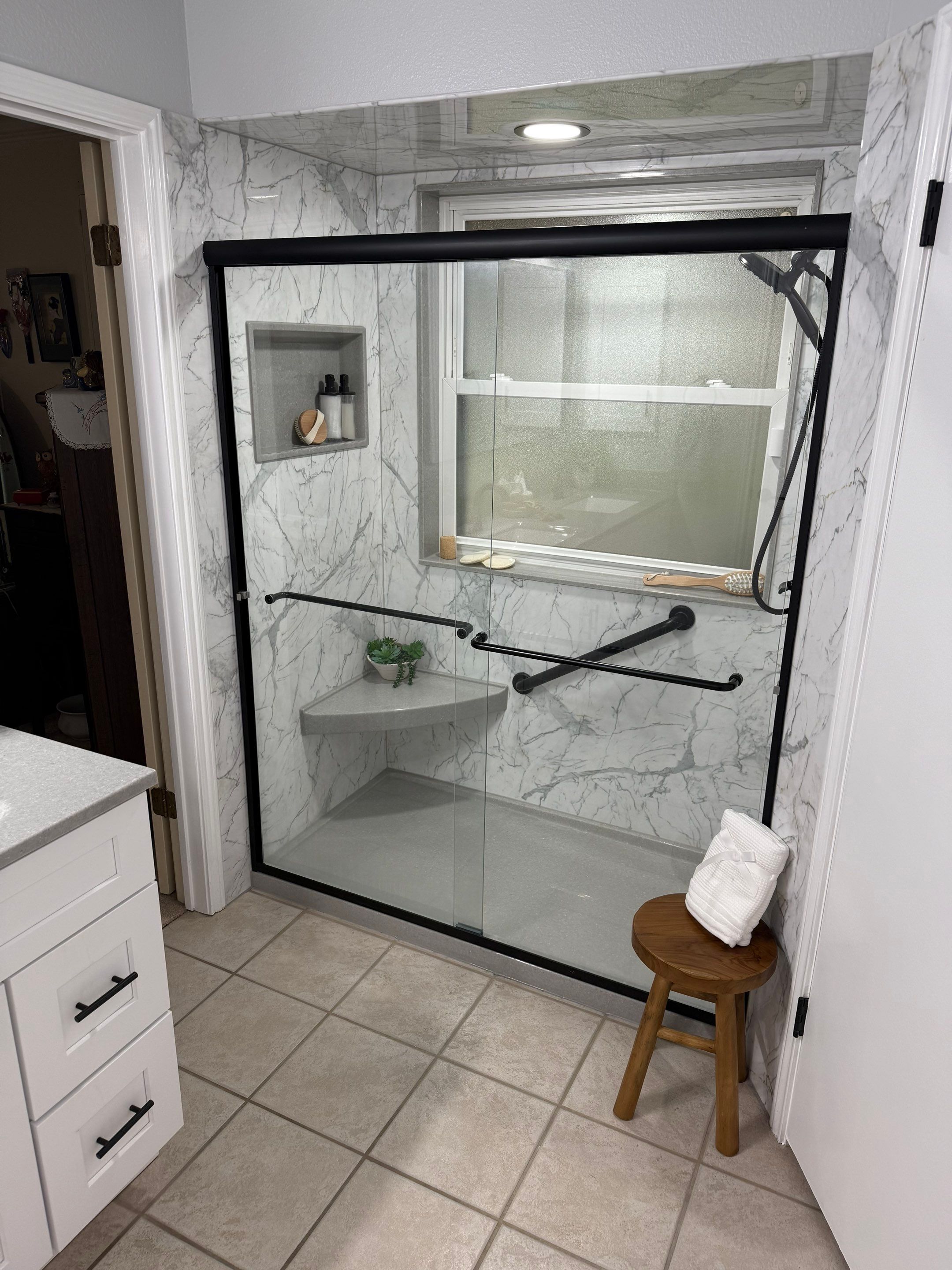 San Antonio Tub-to-Shower Conversion with Safety Features and Updated Vanity by Legacy Bath and Kitchen