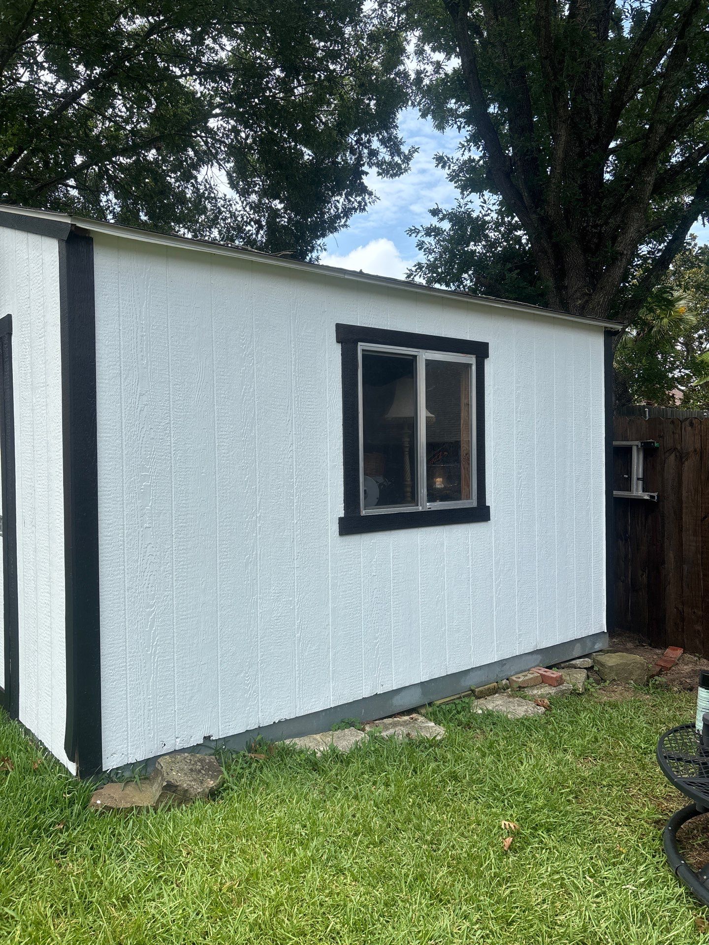 Project in TylerExterior Painting in Tyler, TX | White Brick Home, Varnished Fence & Shed Painting by Quality Coats Painting