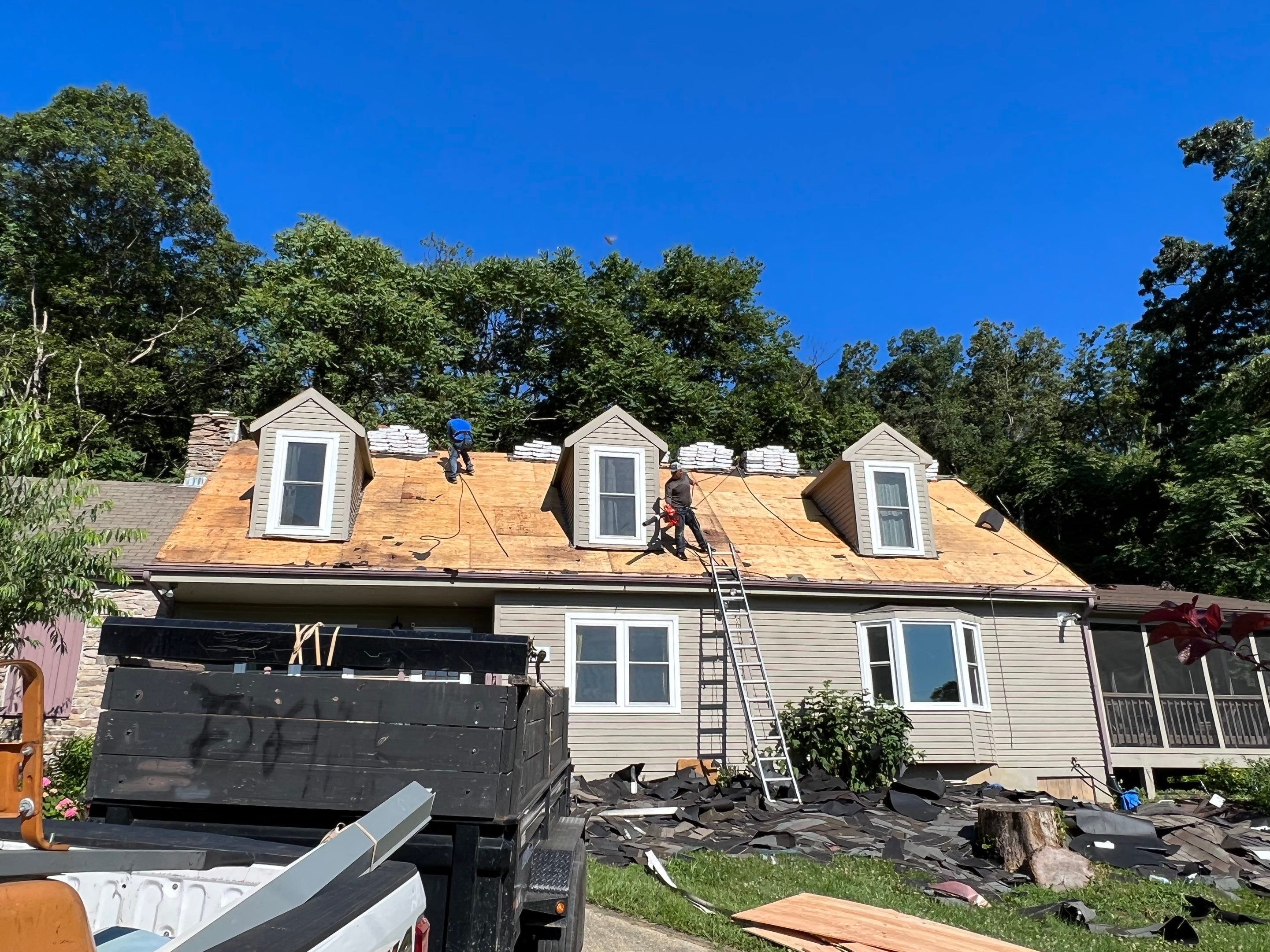 Residential Roofing Installation using Atlas Pinnacle Pristine Black Architectural Shingles by Frederick Roof Repair