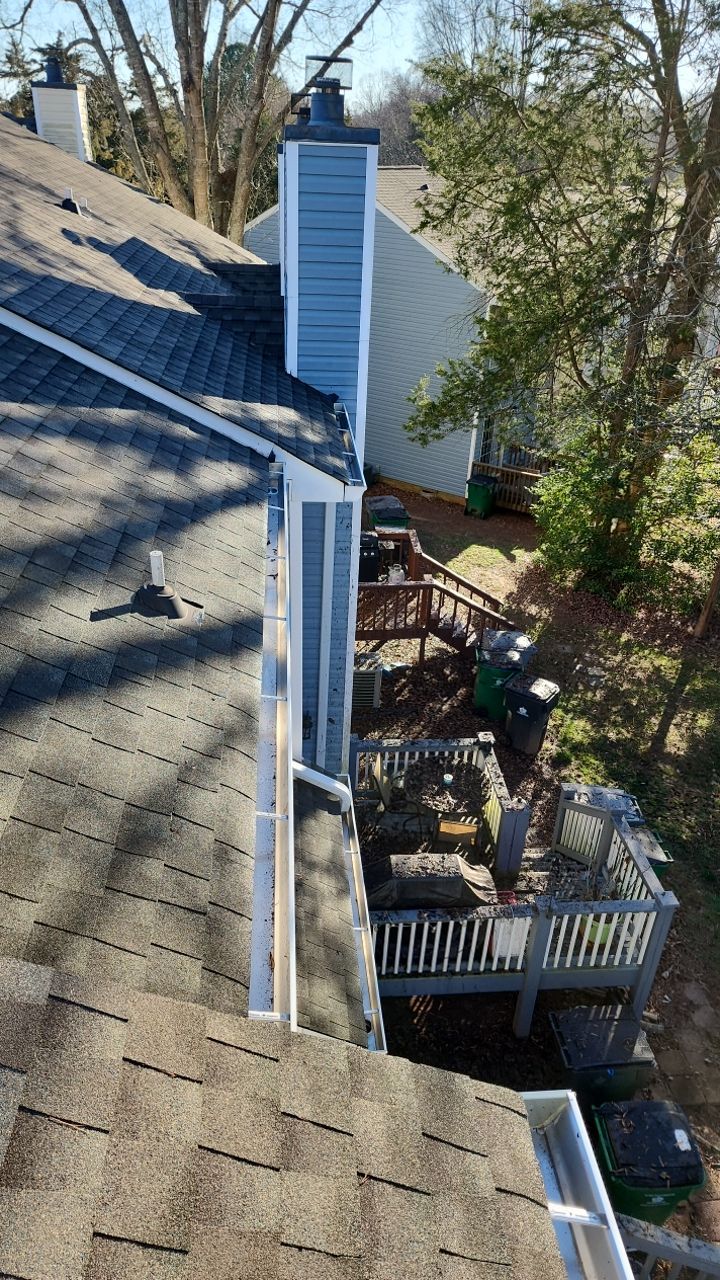 Gutter Cleaning using water by Power Wash Masters LLC
